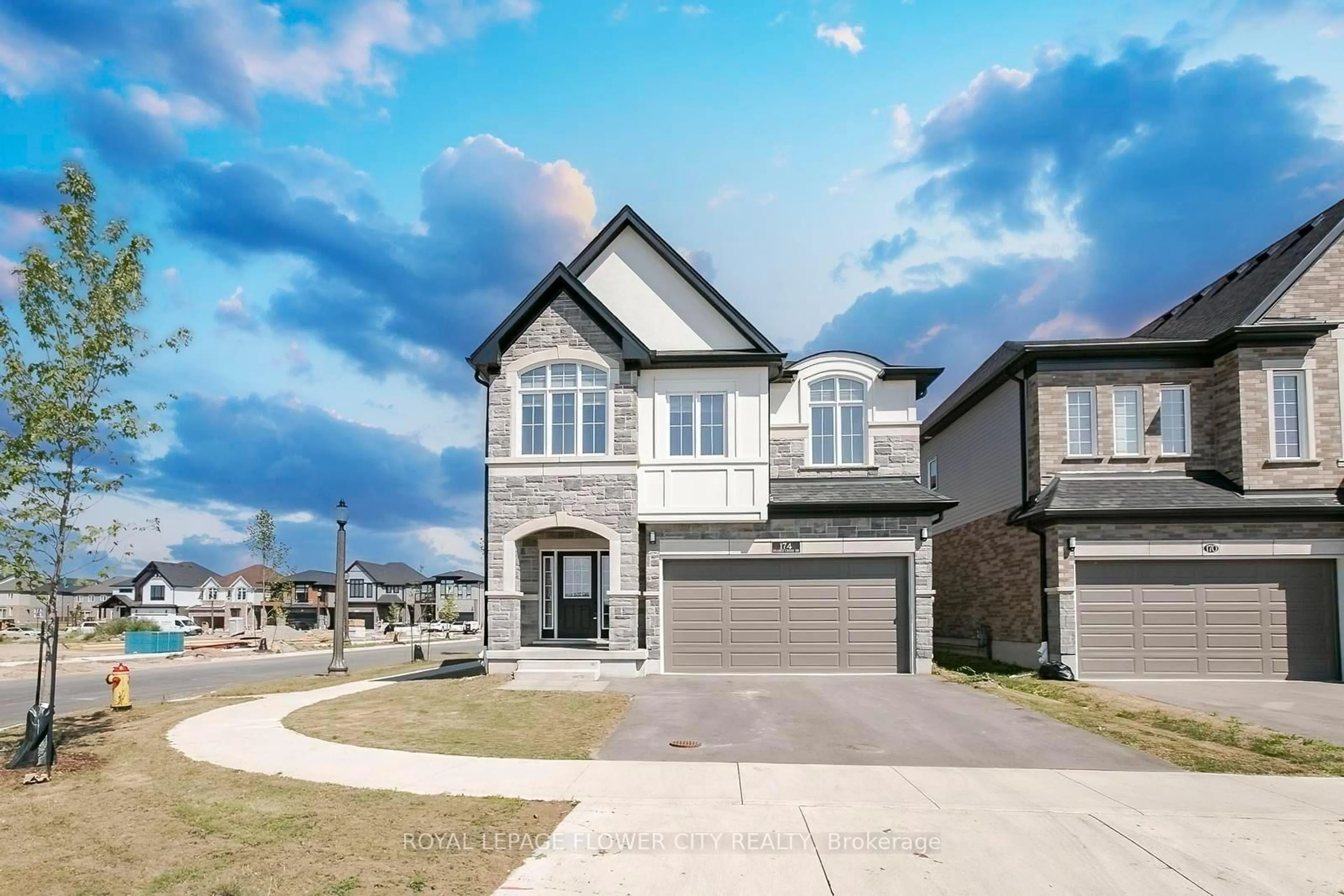Home with brick exterior material, street for 174 Shaded Creek Dr, Kitchener Ontario N2P 0K7