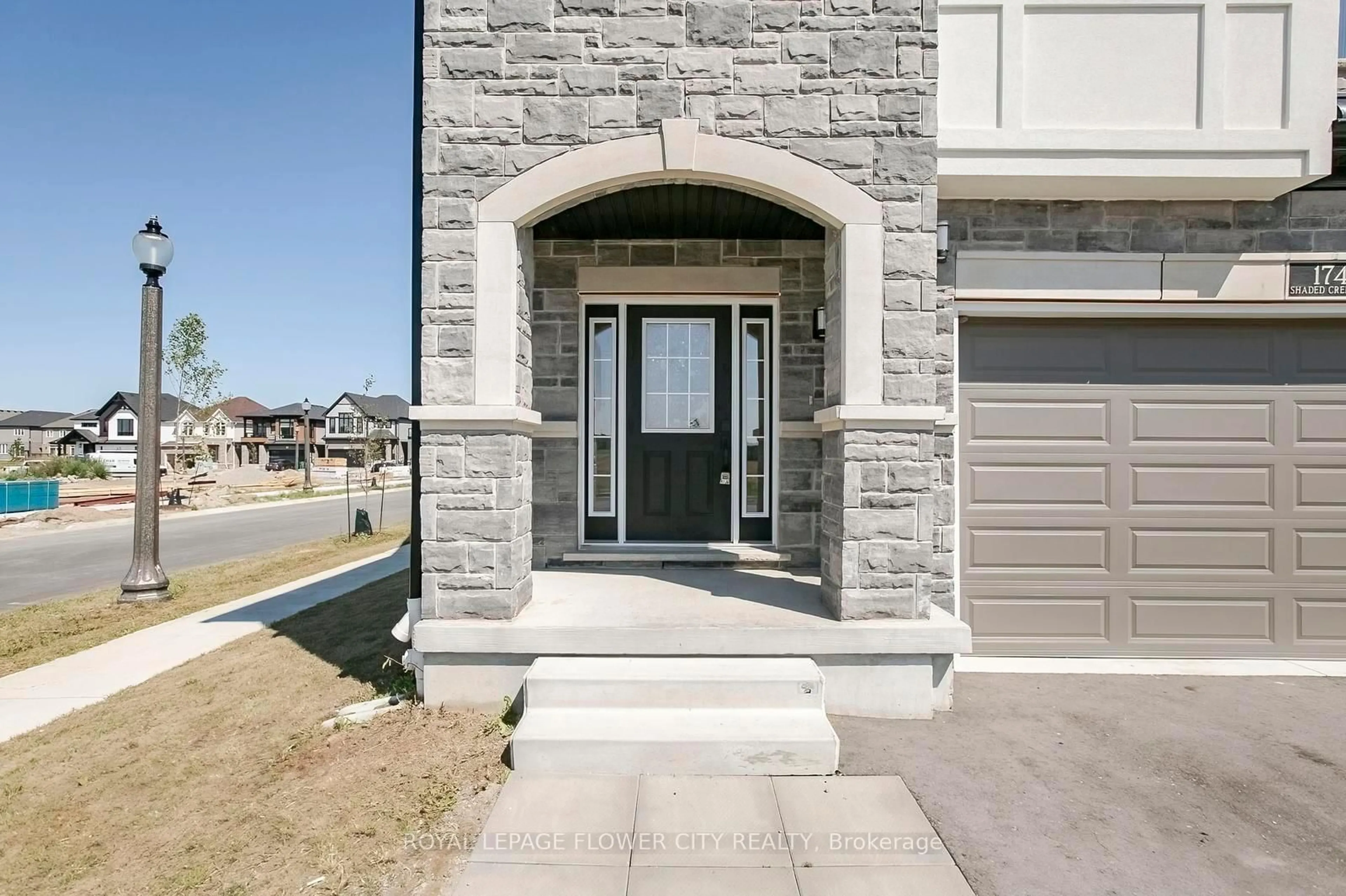 Home with brick exterior material, street for 174 Shaded Creek Dr, Kitchener Ontario N2P 0K7