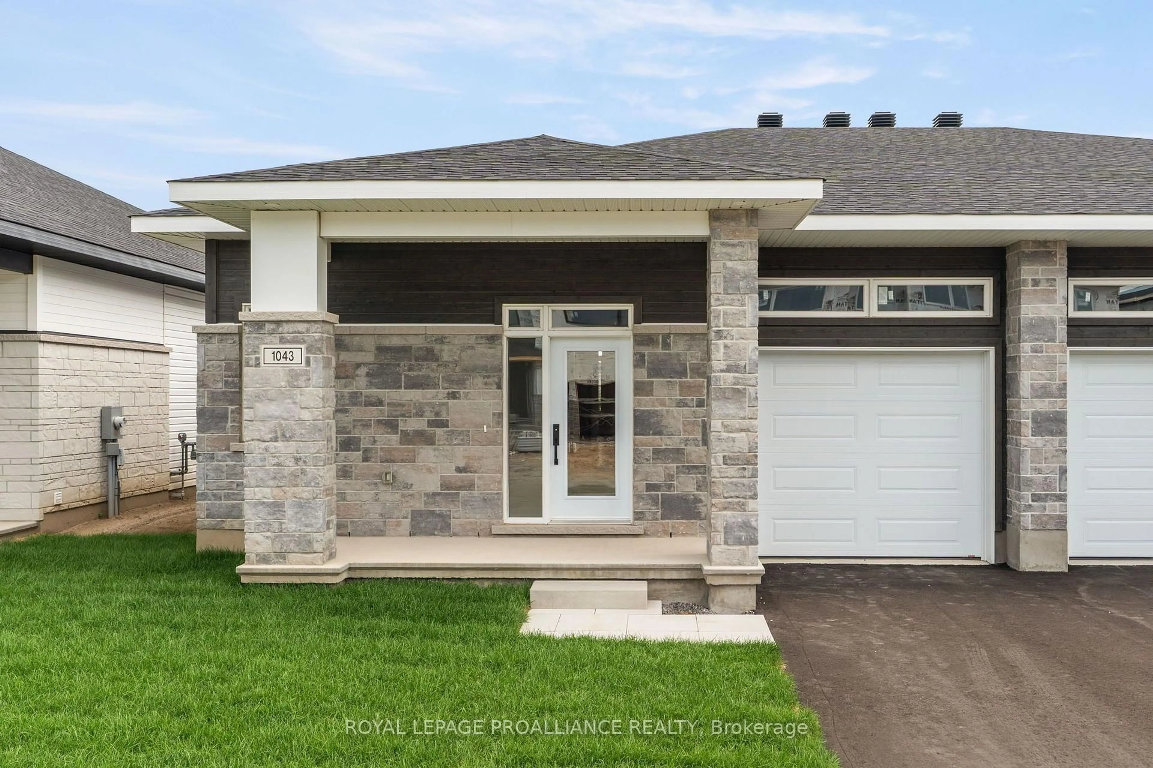 Home with brick exterior material, street for 1043 Moore St, Brockville Ontario K6V 0H1