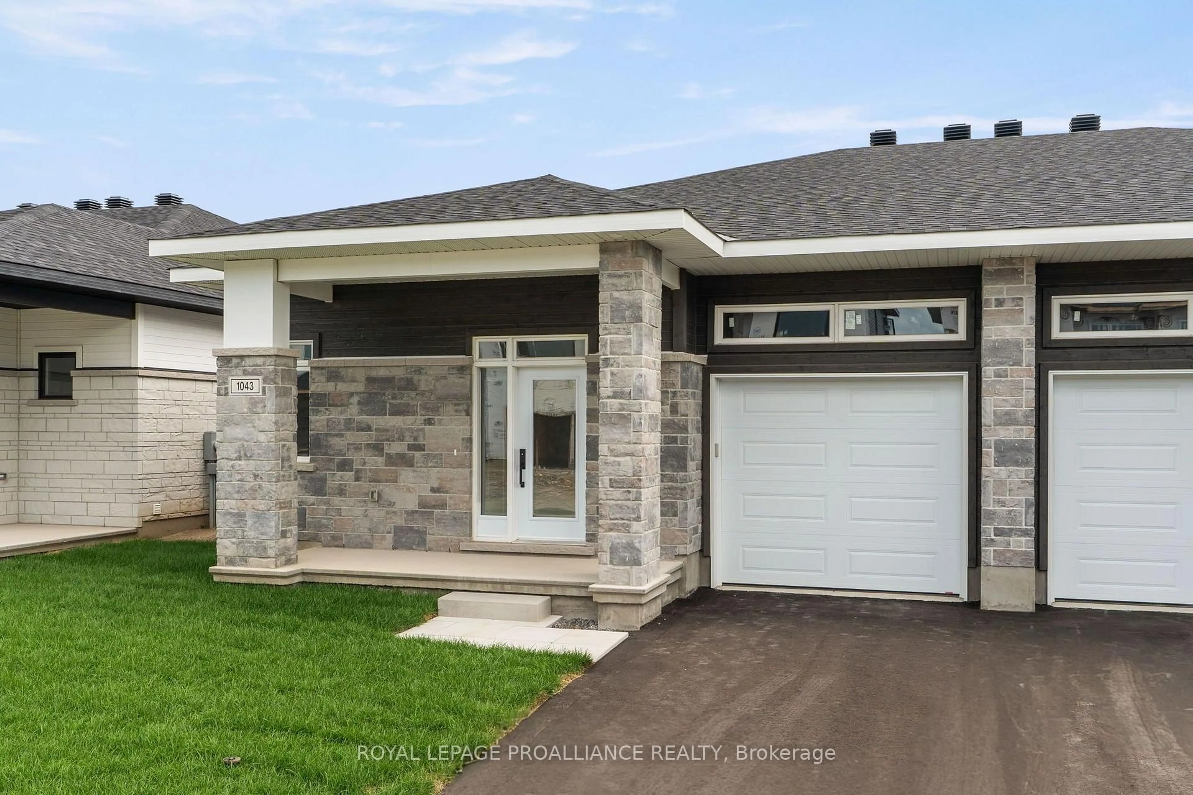 Home with brick exterior material, street for 1043 Moore St, Brockville Ontario K6V 0H1
