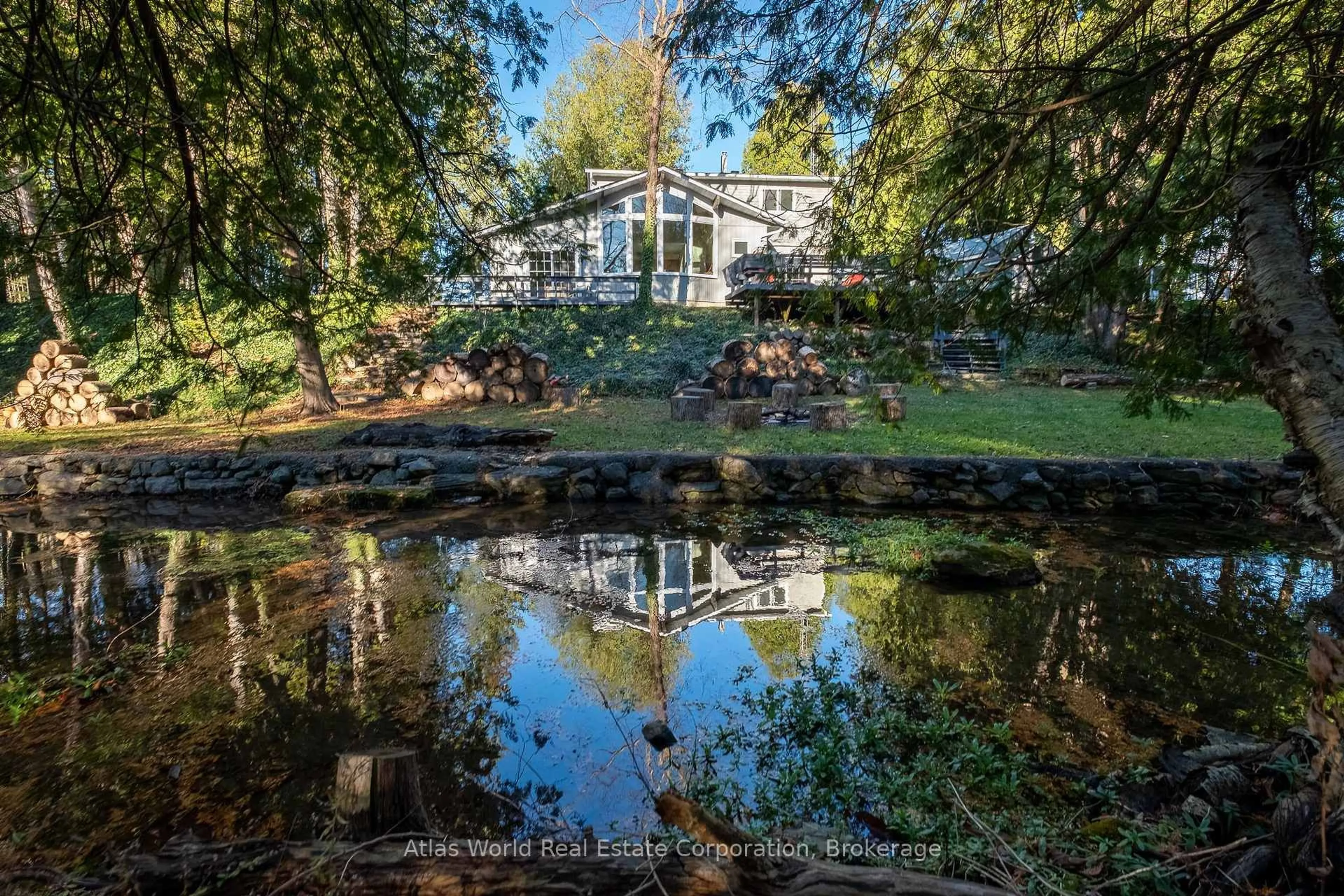 A pic from outside/outdoor area/front of a property/back of a property/a pic from drone, water/lake/river/ocean view for 19 Front St, South Bruce Peninsula Ontario N0H 2T0