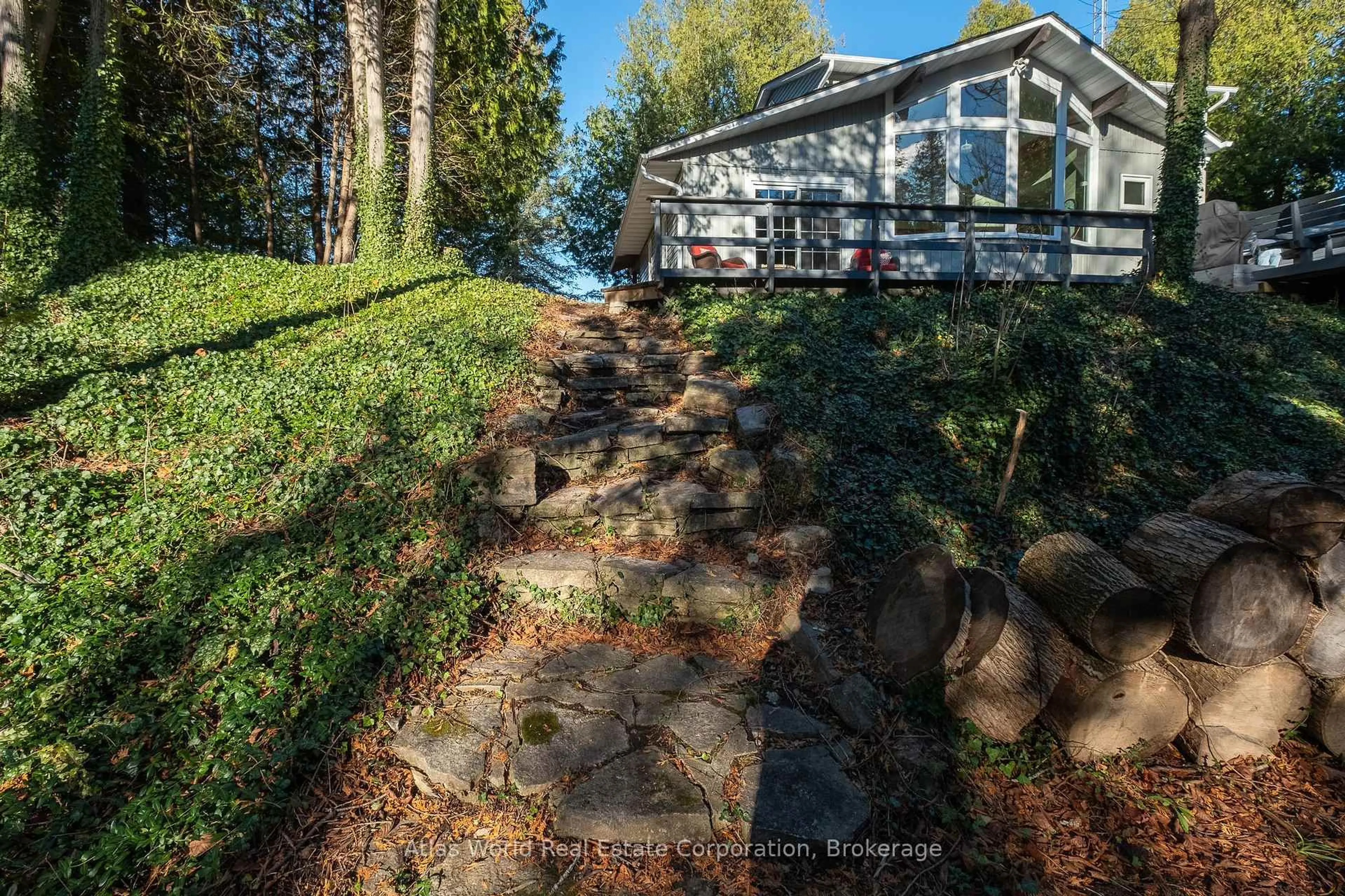 A pic from outside/outdoor area/front of a property/back of a property/a pic from drone, forest/trees view for 19 Front St, South Bruce Peninsula Ontario N0H 2T0