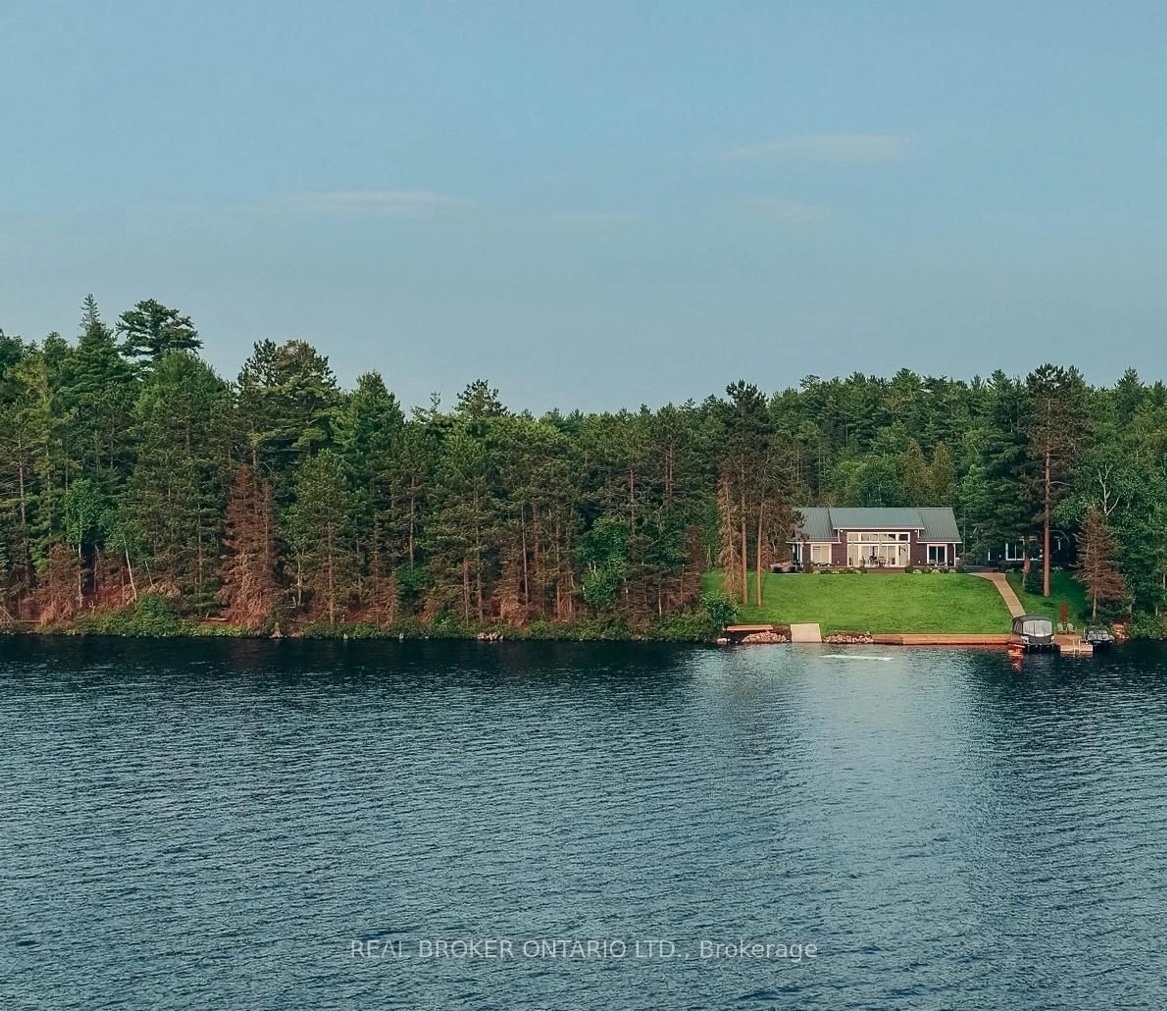 A pic from outside/outdoor area/front of a property/back of a property/a pic from drone, water/lake/river/ocean view for 7 La Casa Del Lago Rd, Greater Sudbury Ontario P3E 4N1