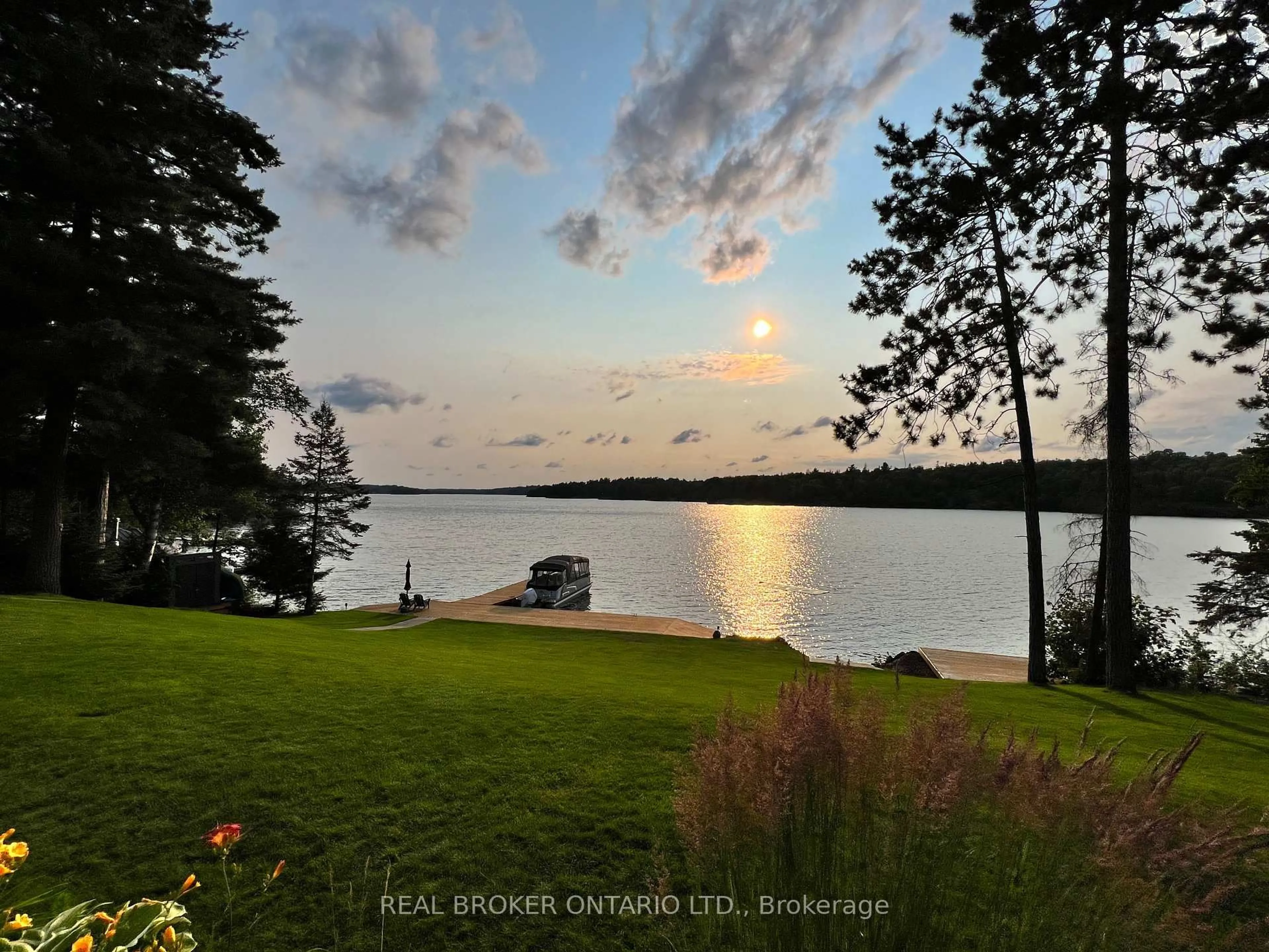 A pic from outside/outdoor area/front of a property/back of a property/a pic from drone, water/lake/river/ocean view for 7 La Casa Del Lago Rd, Greater Sudbury Ontario P3E 4N1