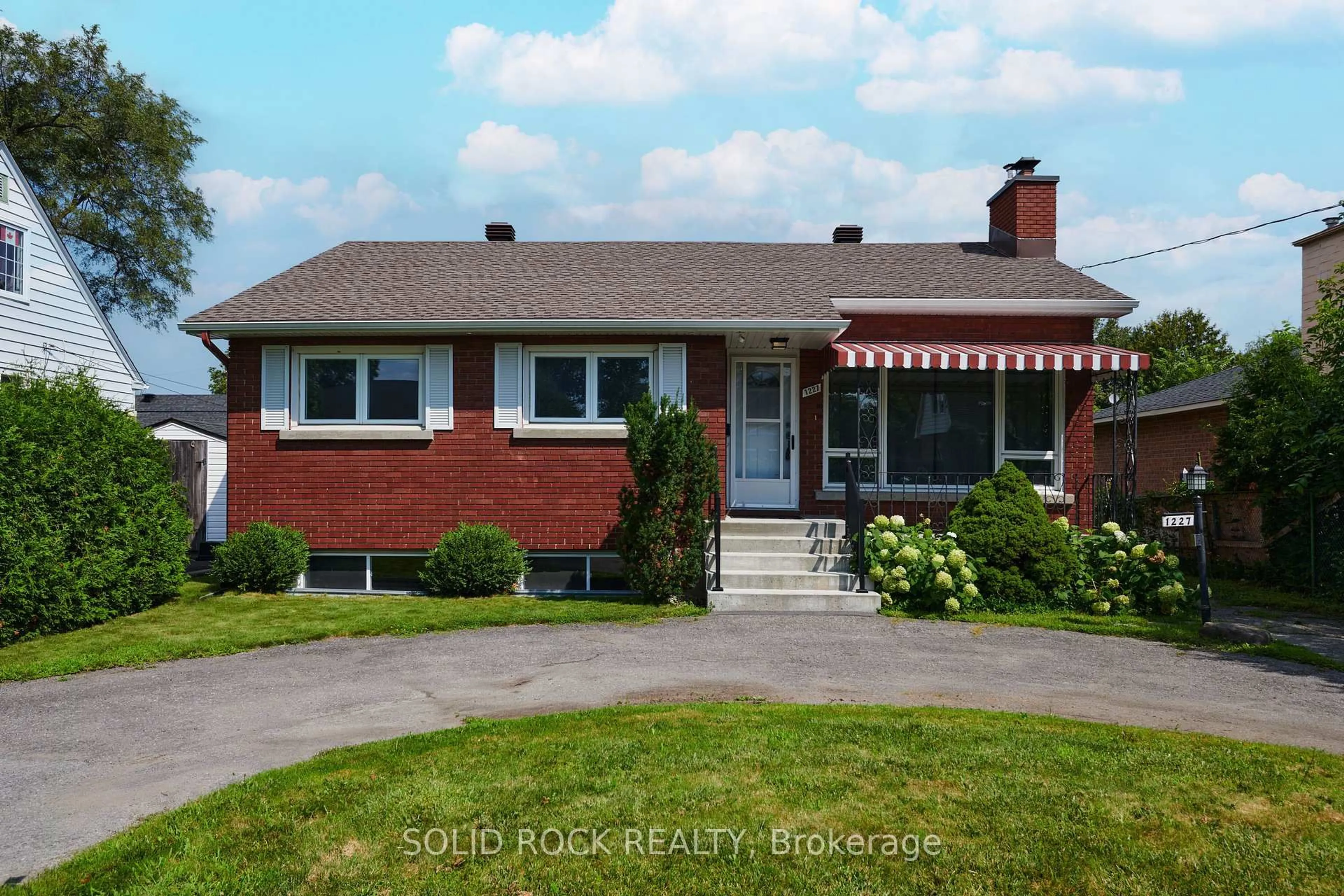 Home with brick exterior material, street for 1227 Portland Ave, Ottawa Ontario K1V 6G1