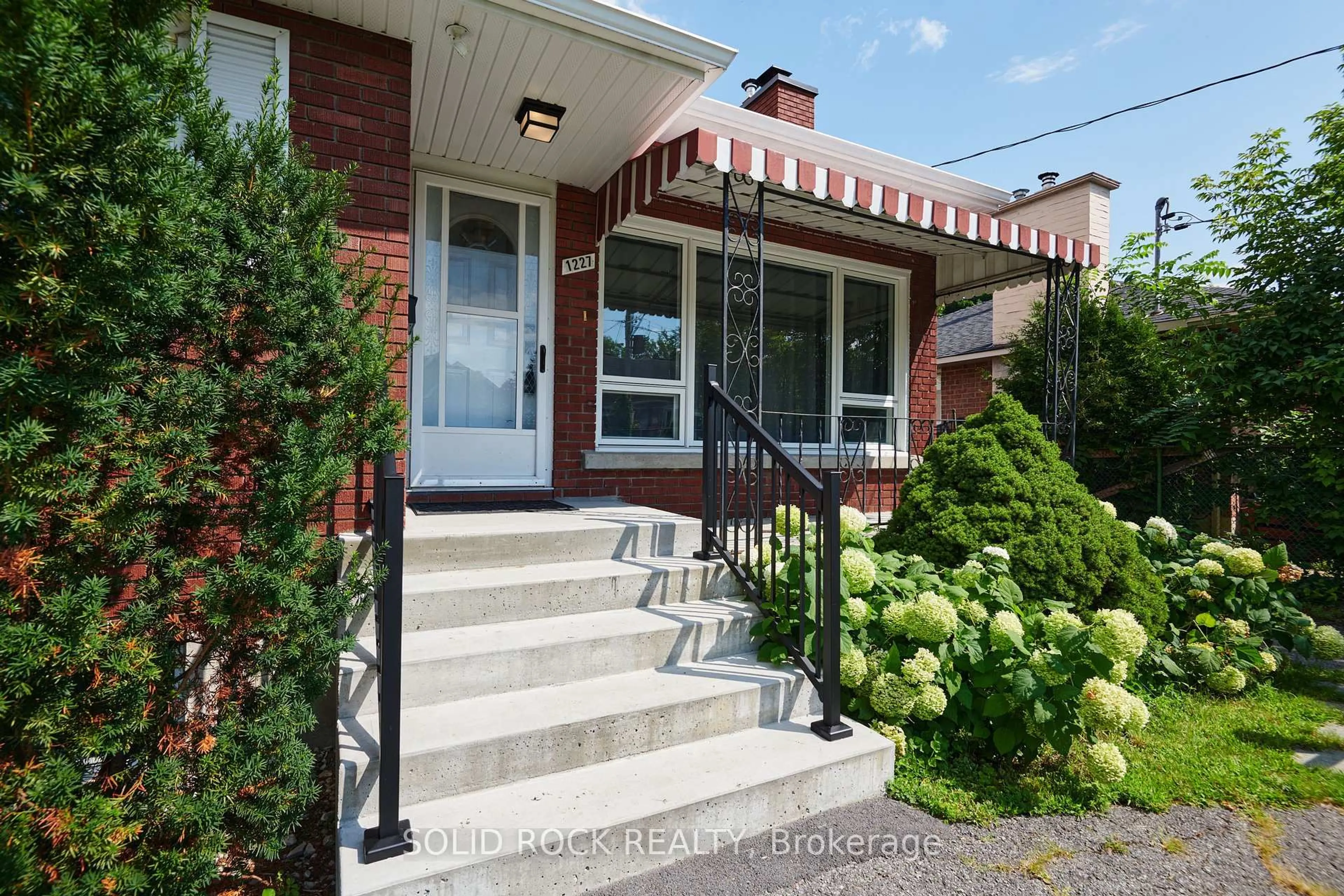 Home with brick exterior material, street for 1227 Portland Ave, Ottawa Ontario K1V 6G1