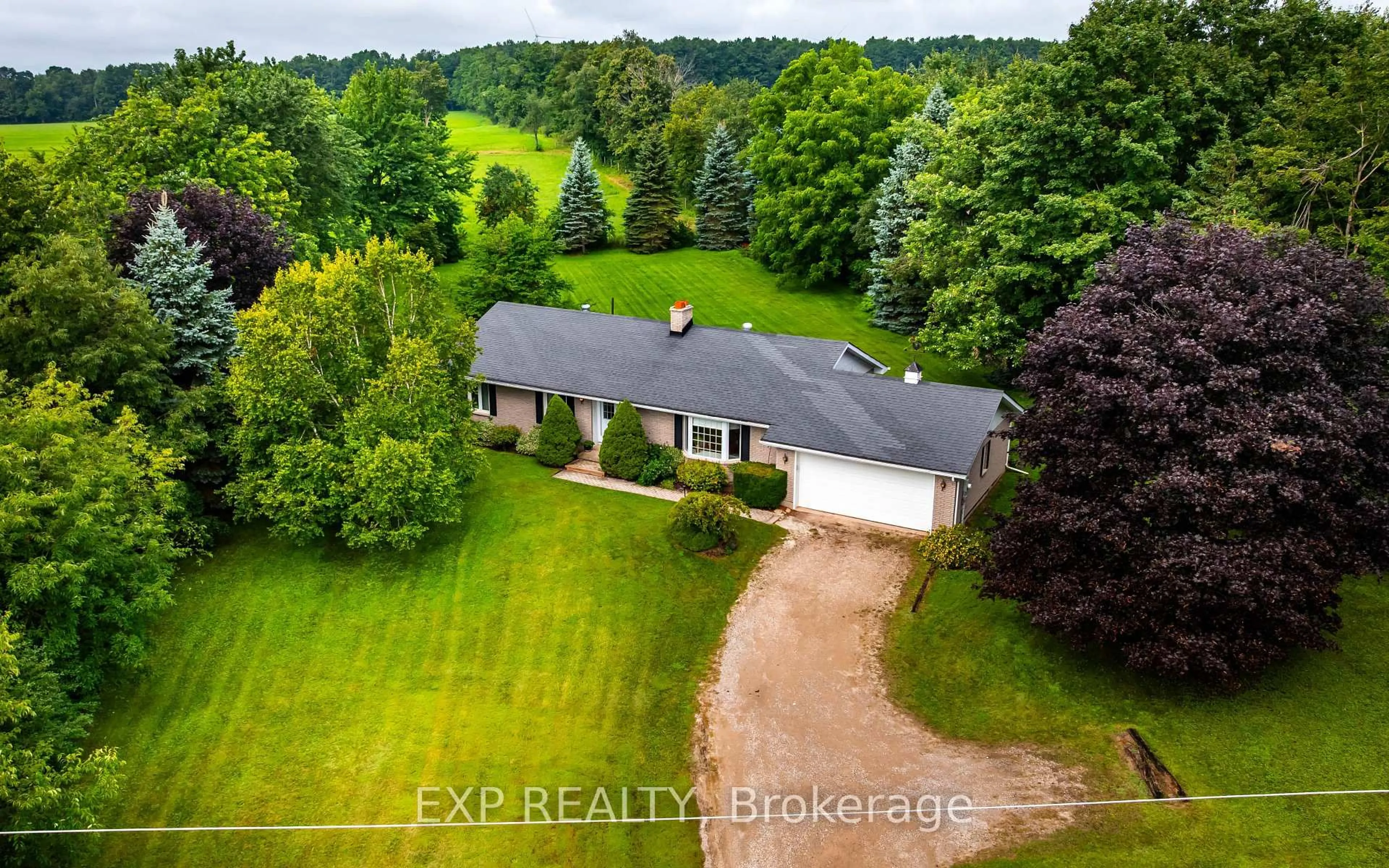 A pic from outside/outdoor area/front of a property/back of a property/a pic from drone, water/lake/river/ocean view for 594356 Blind Line, Mono Ontario L9W 5N3