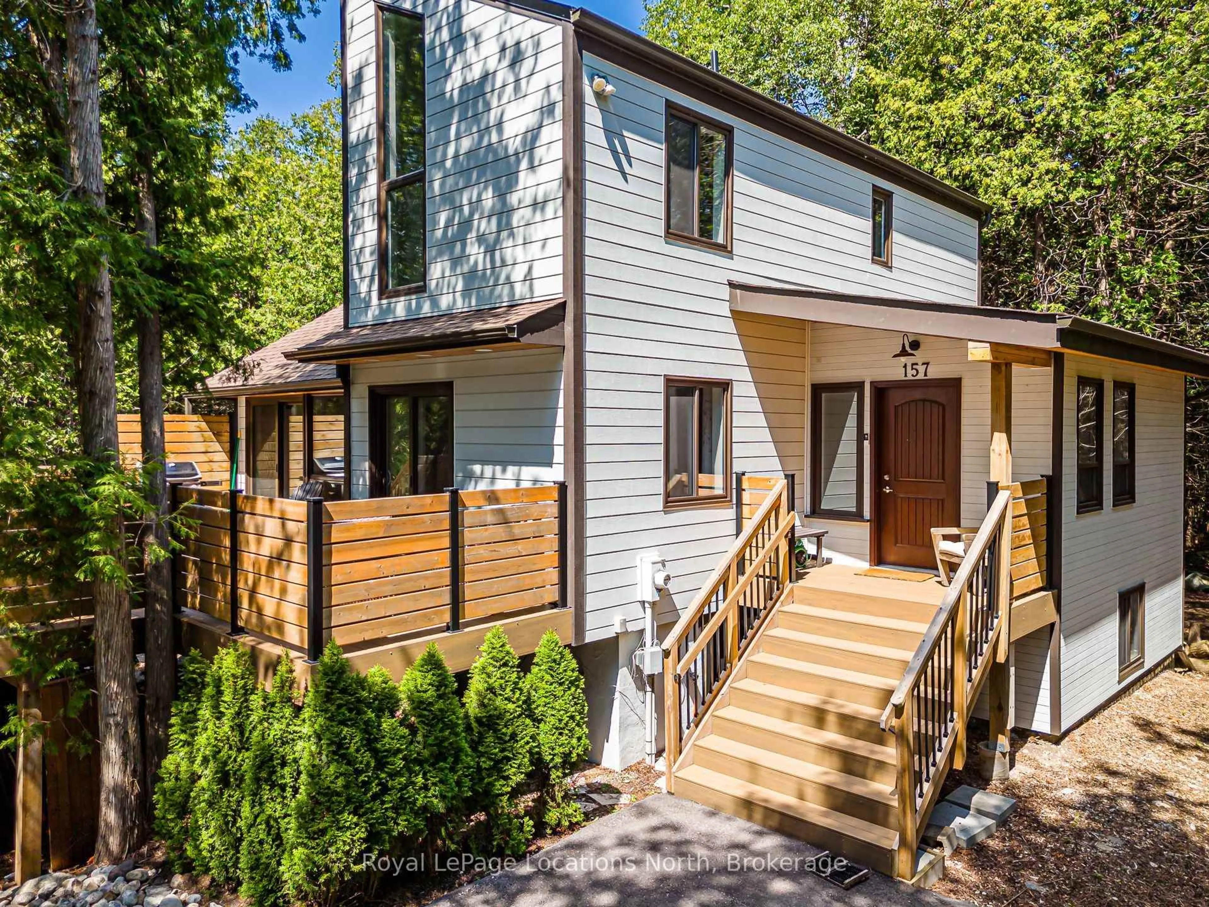 Home with vinyl exterior material, street for 157 Woodland Park Rd, Blue Mountains Ontario N0H 1J0