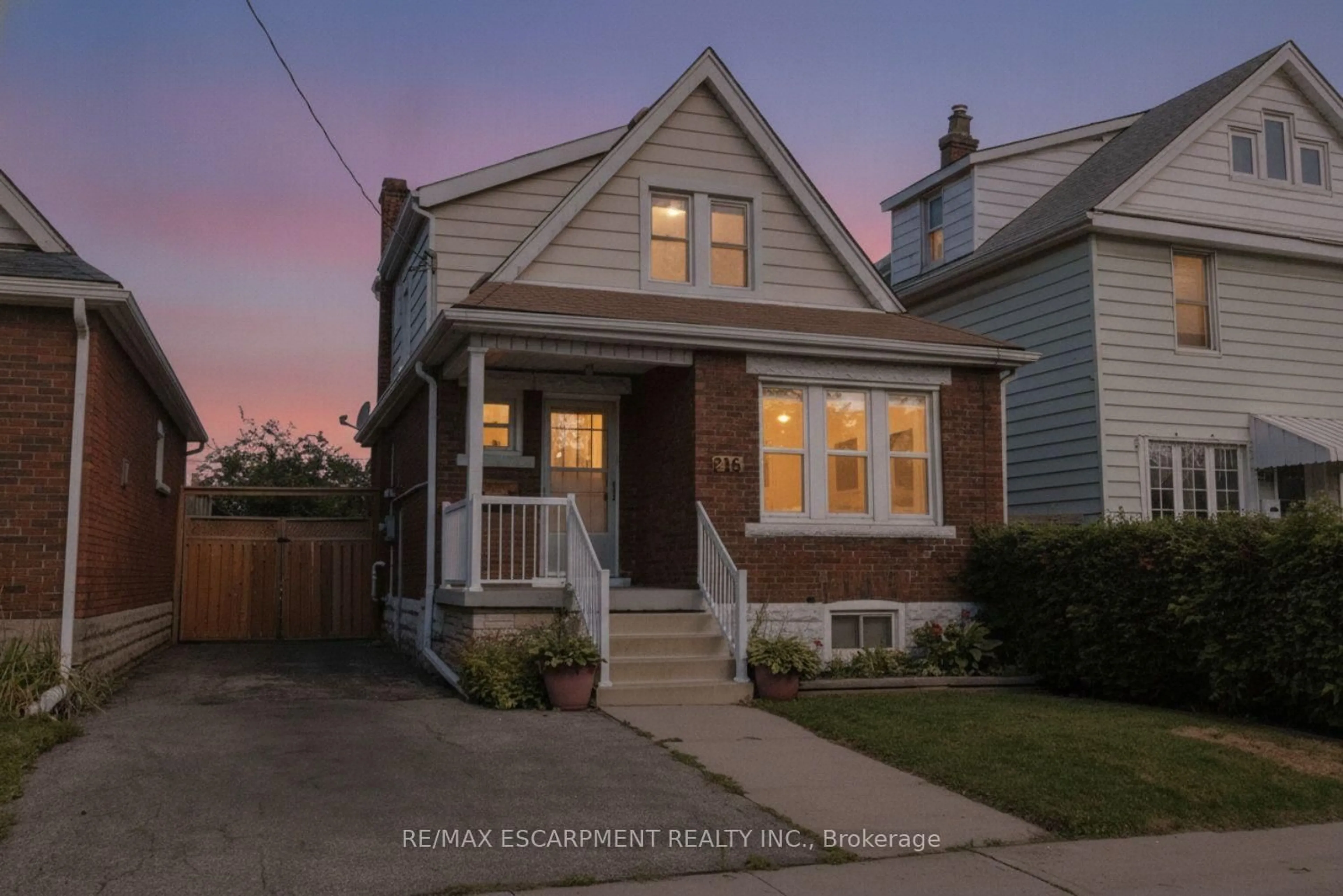 Home with vinyl exterior material, street for 215 Paling Ave, Hamilton Ontario L8H 5J6