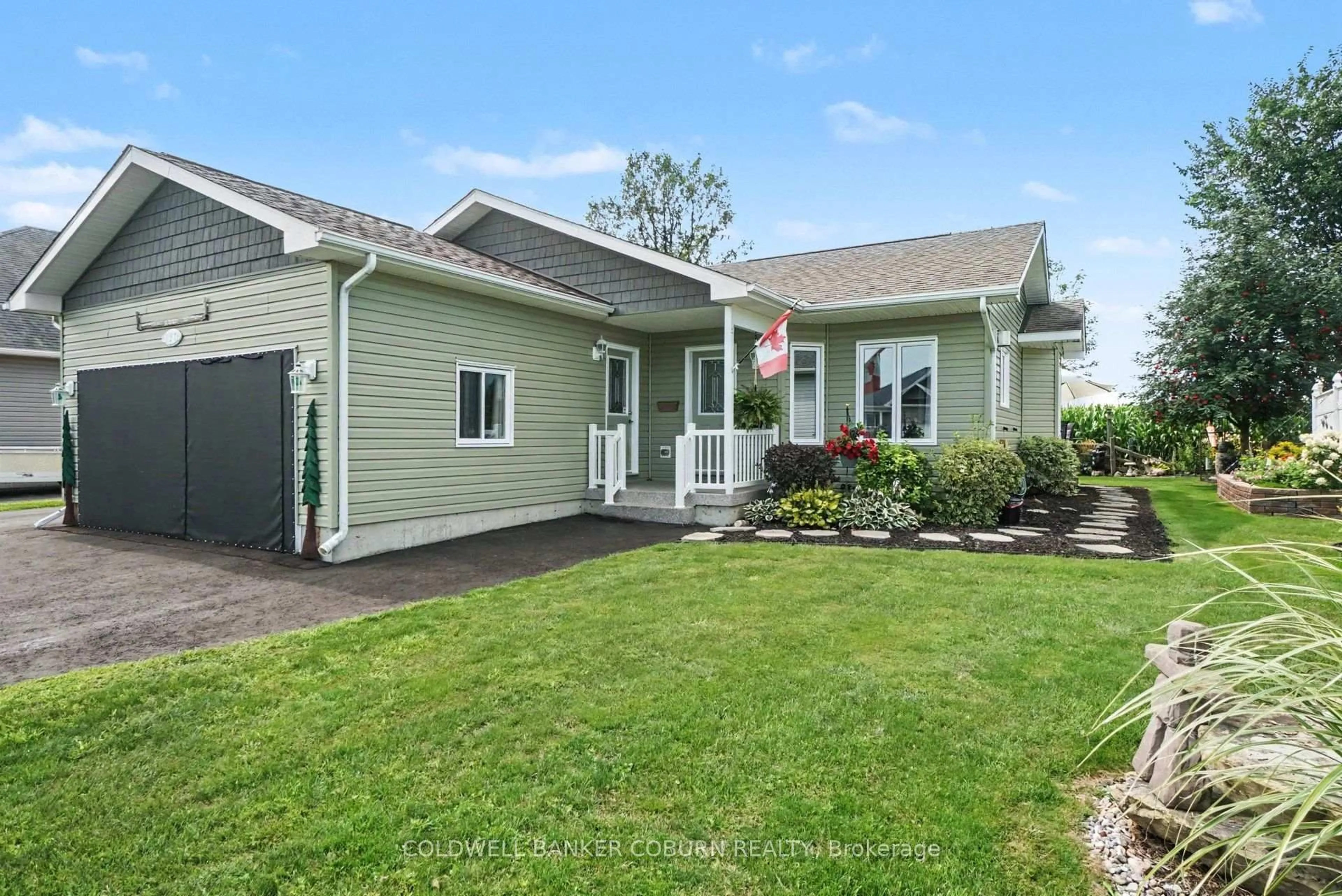 Home with vinyl exterior material, street for 127 Elizabeth Dr, North Dundas Ontario K0C 1H0