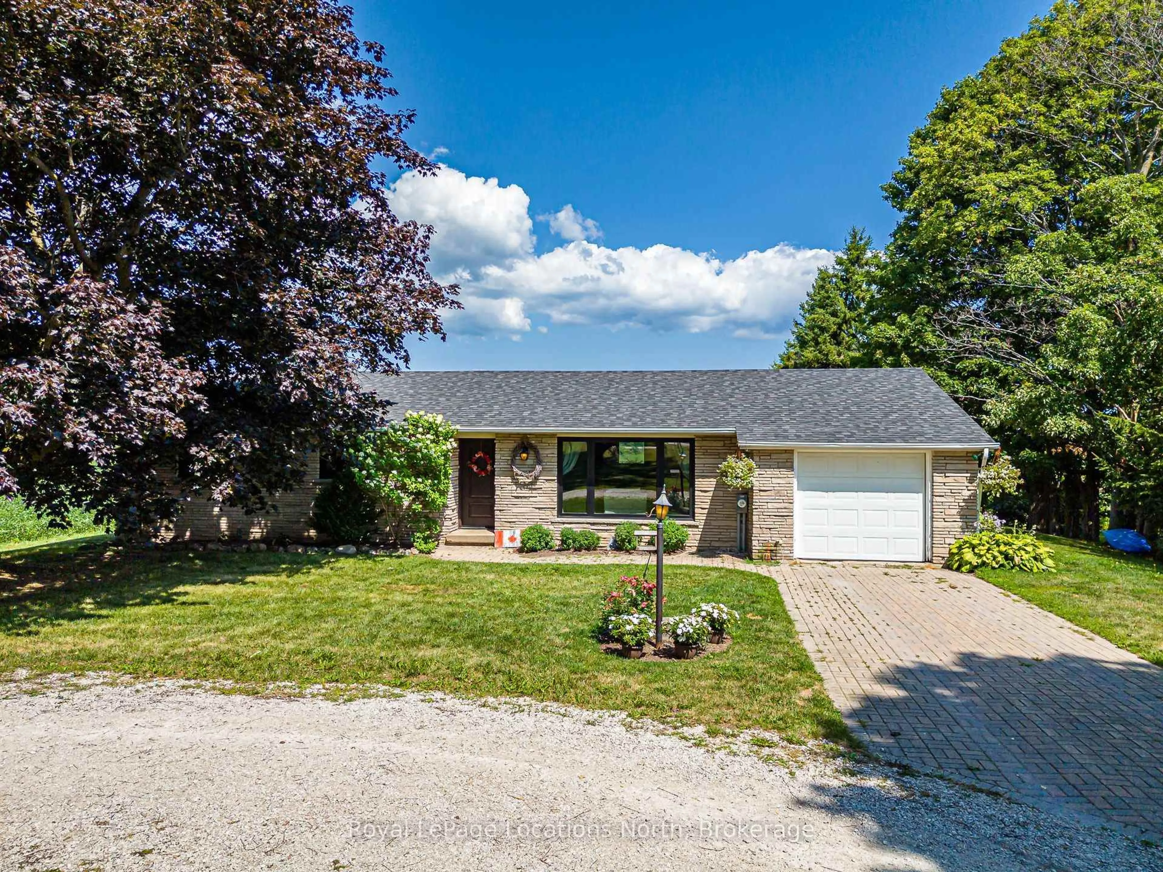 A pic from outside/outdoor area/front of a property/back of a property/a pic from drone, street for 728099 21 Sdrd, Blue Mountains Ontario N0H 1J0