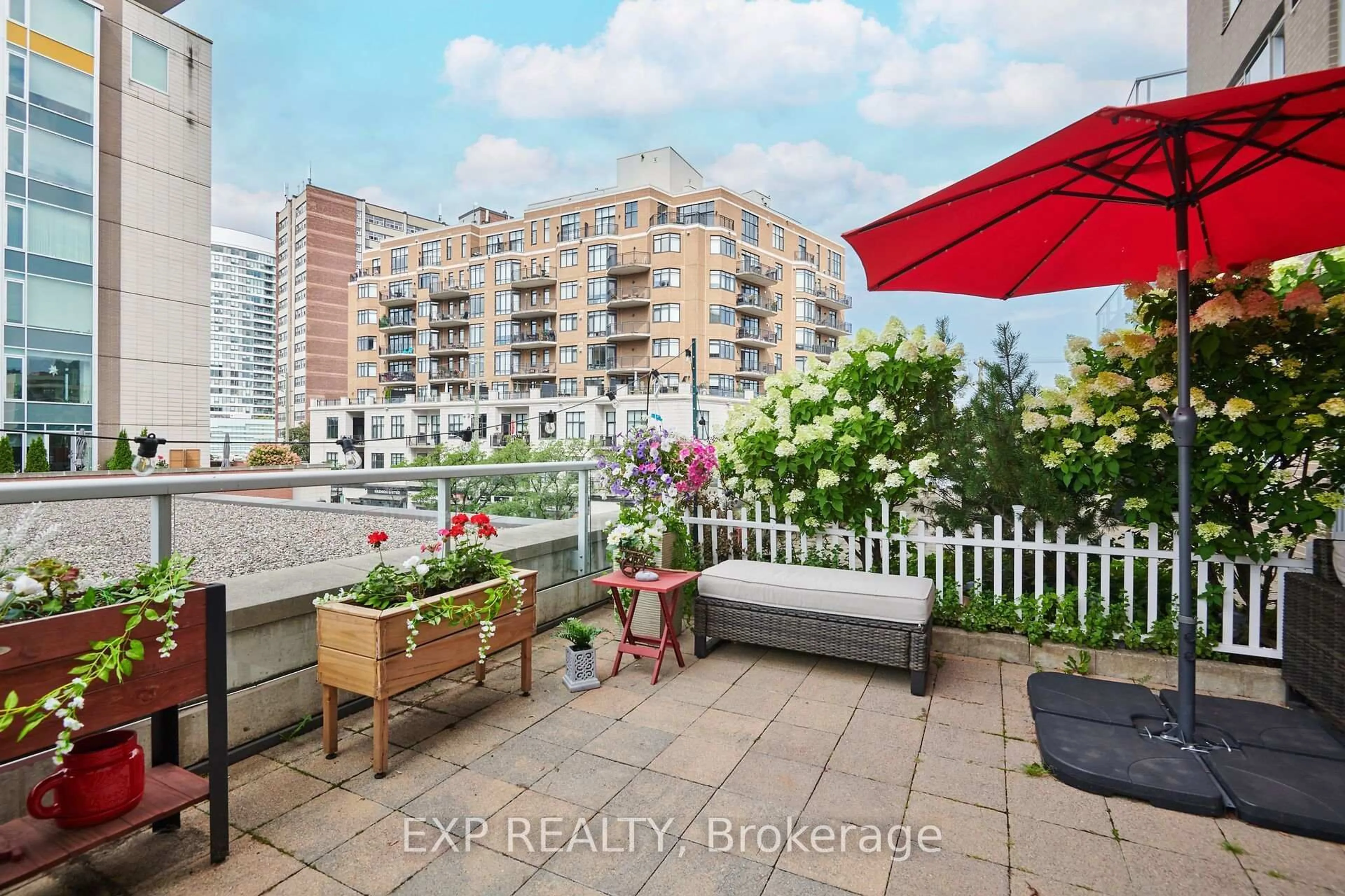 Patio, city buildings view from balcony for 575 Byron Ave #203, Ottawa Ontario K2A 1R7