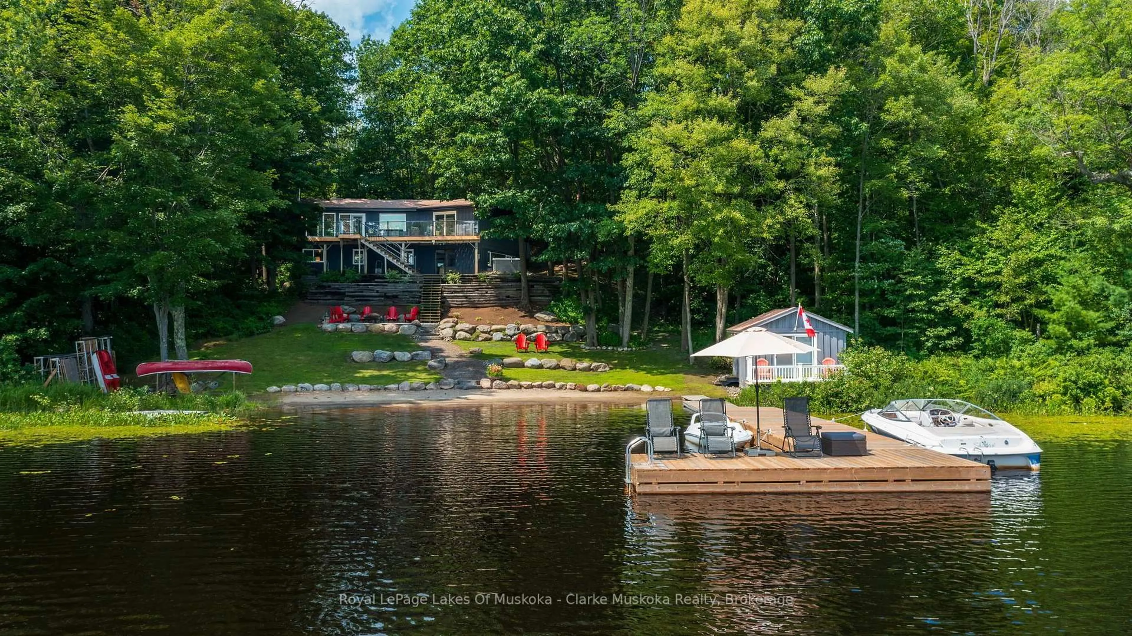 A pic from outside/outdoor area/front of a property/back of a property/a pic from drone, water/lake/river/ocean view for 1048 Brackenrig Rd, Muskoka Lakes Ontario P0B 1J0