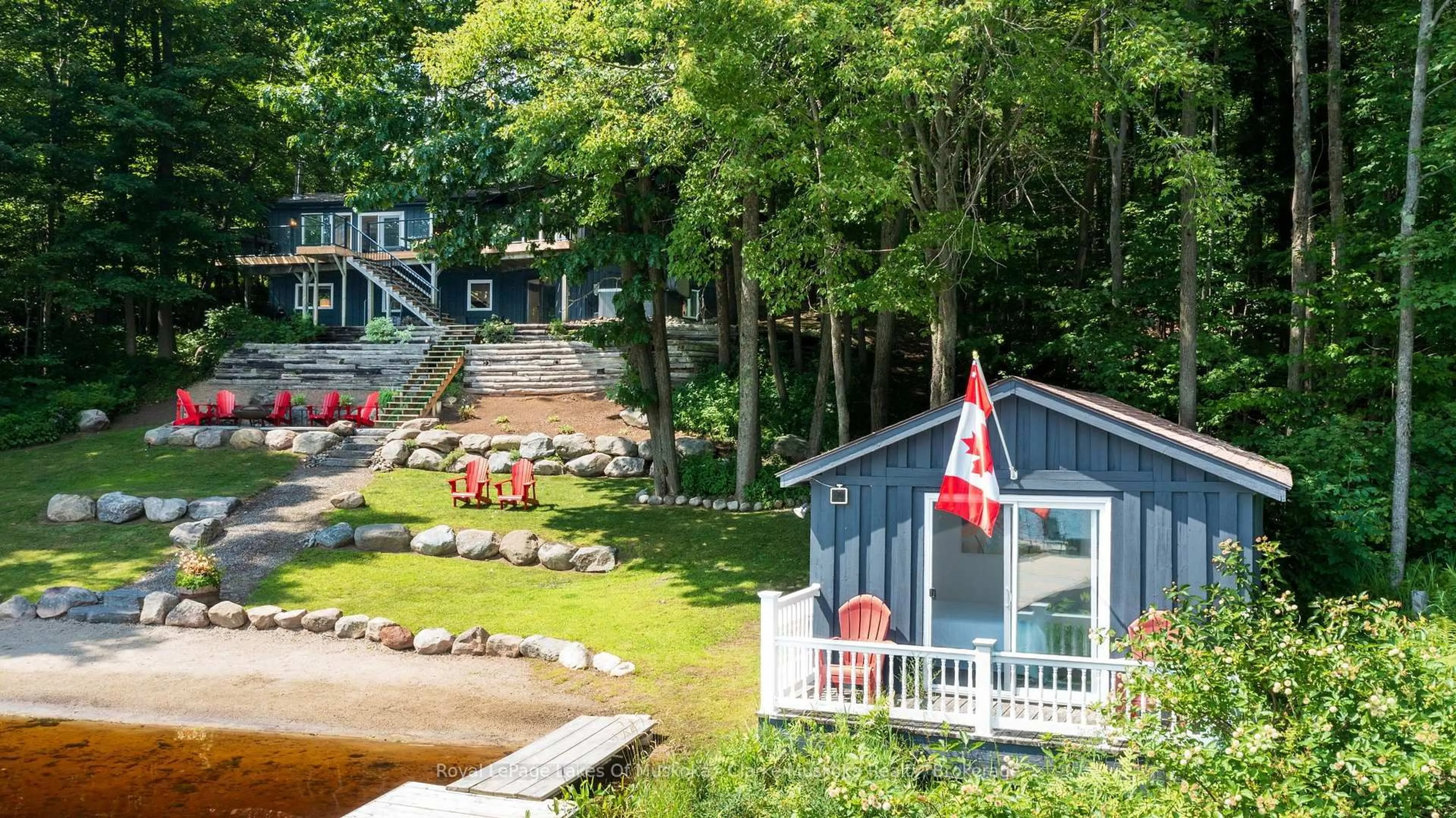 A pic from outside/outdoor area/front of a property/back of a property/a pic from drone, water/lake/river/ocean view for 1048 Brackenrig Rd, Muskoka Lakes Ontario P0B 1J0