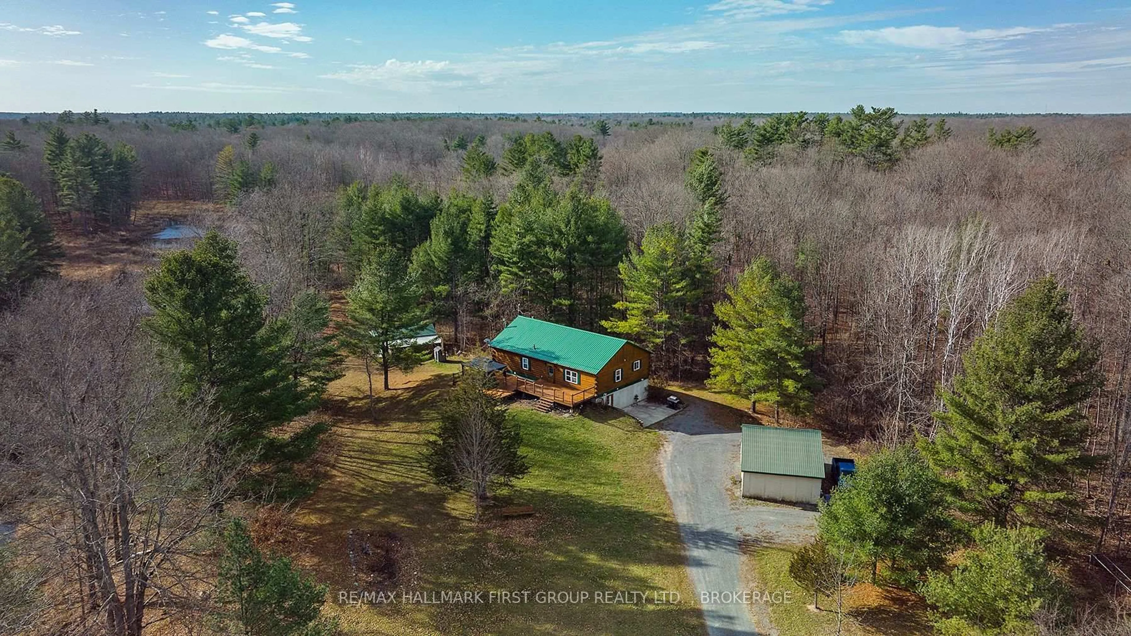 A pic from outside/outdoor area/front of a property/back of a property/a pic from drone, forest/trees view for 2723 Desert Lake Rd, Hartington Ontario K0H 1W0