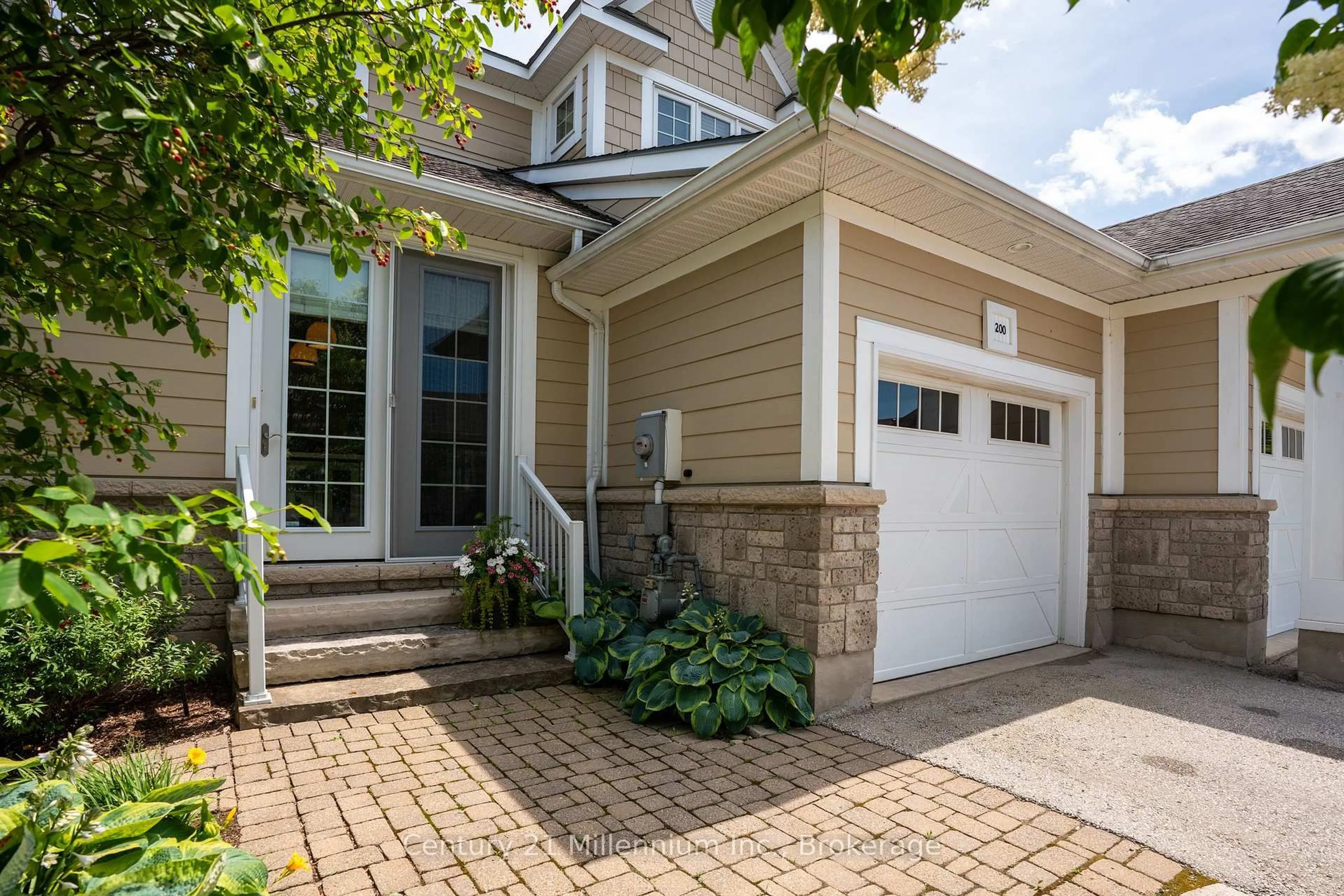 Home with brick exterior material, street for 200 Ironwood Way, Georgian Bluffs Ontario N0H 1S0