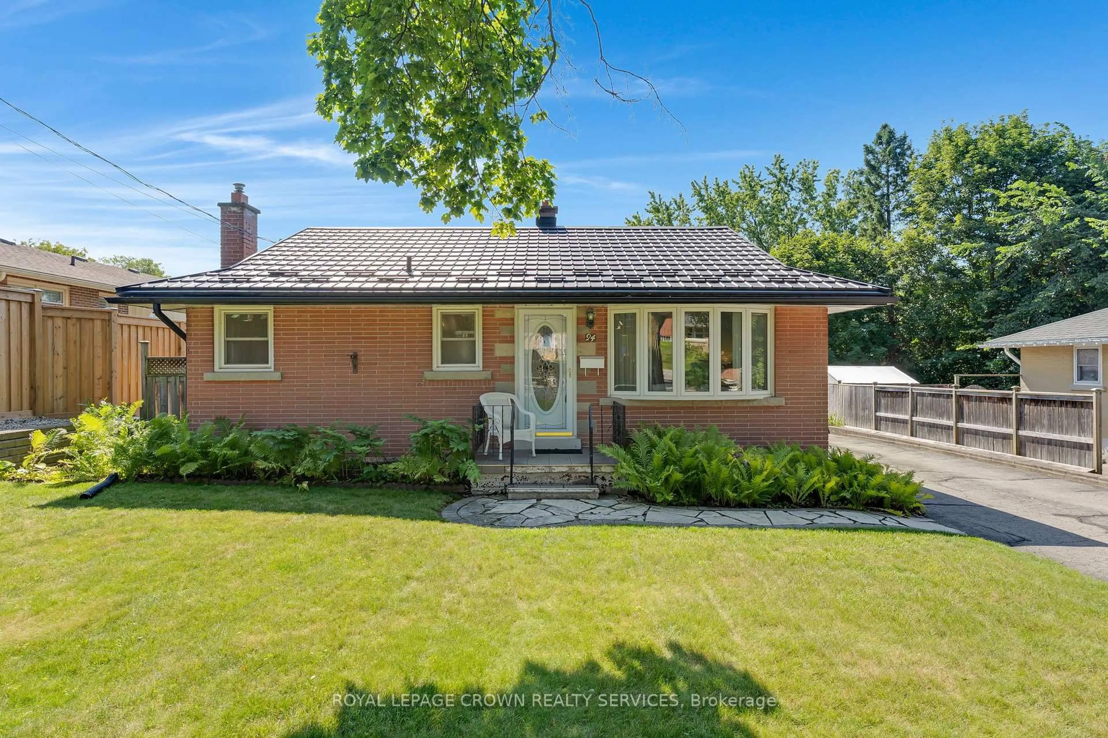 Home with brick exterior material, street for 94 Ottawa Cres, Guelph Ontario N1E 2A9