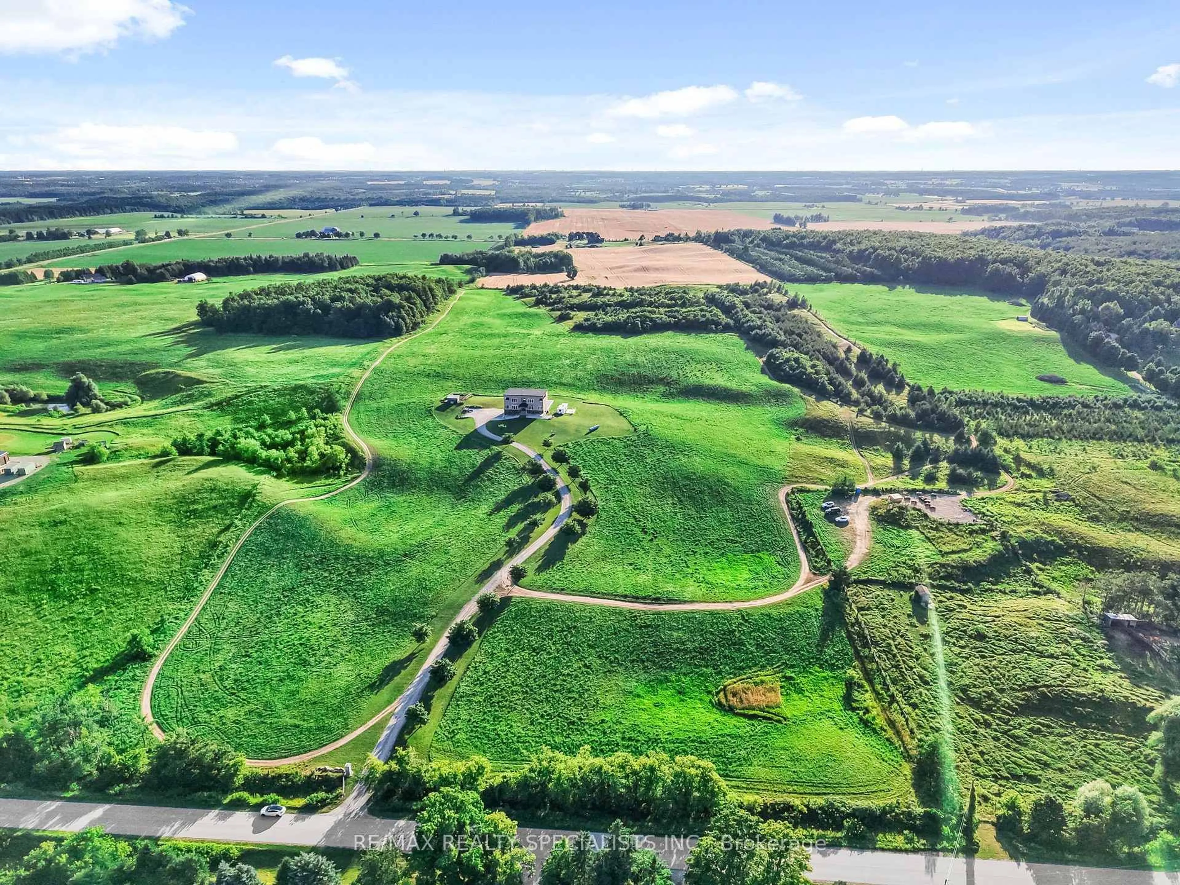 A pic from outside/outdoor area/front of a property/back of a property/a pic from drone, forest/trees view for 676378 Centre Rd, Mulmur Ontario L9V 0E1