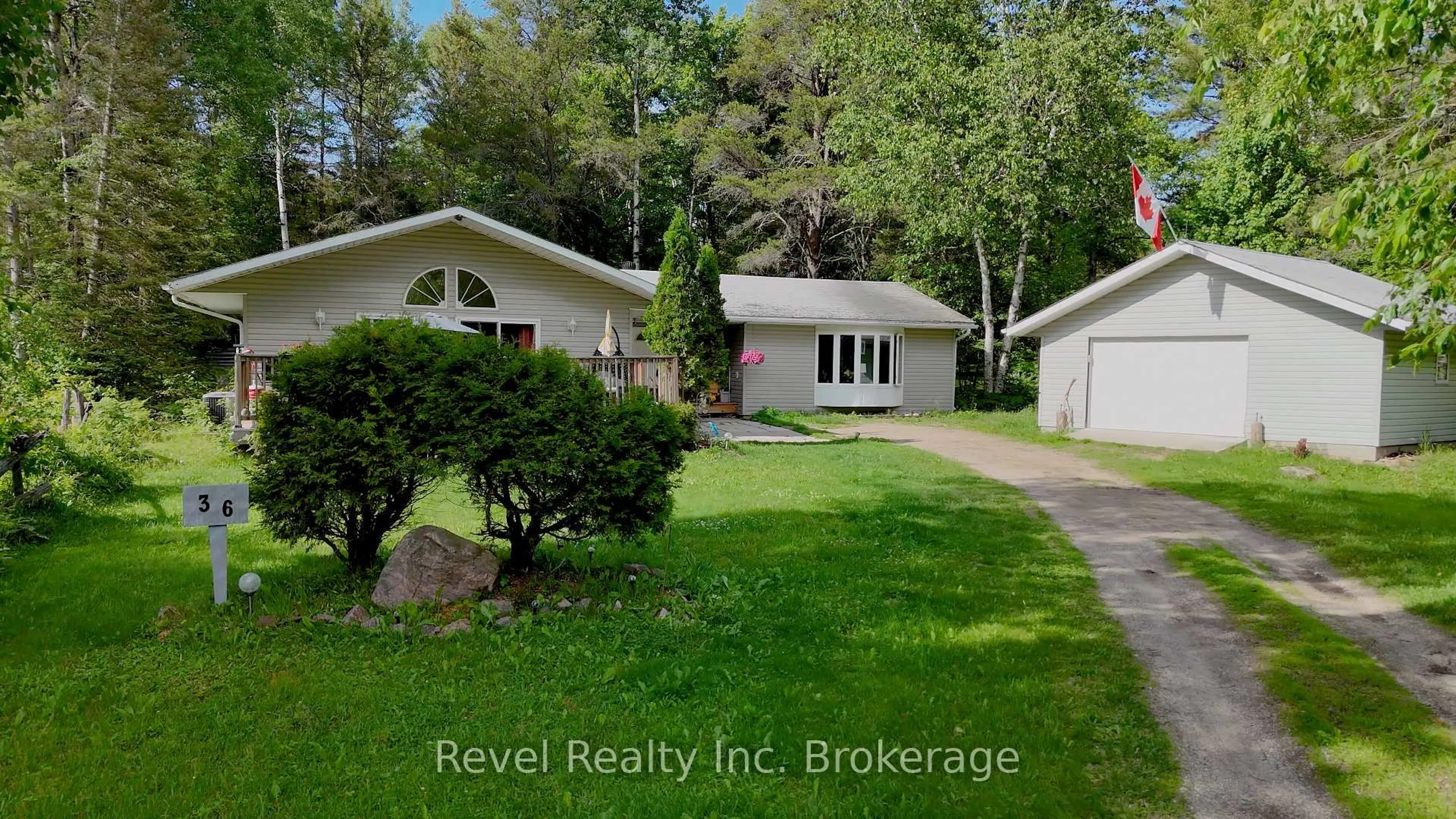 A pic from outside/outdoor area/front of a property/back of a property/a pic from drone, unknown for 36 Tebby Blvd, South River Ontario P0A 1X0