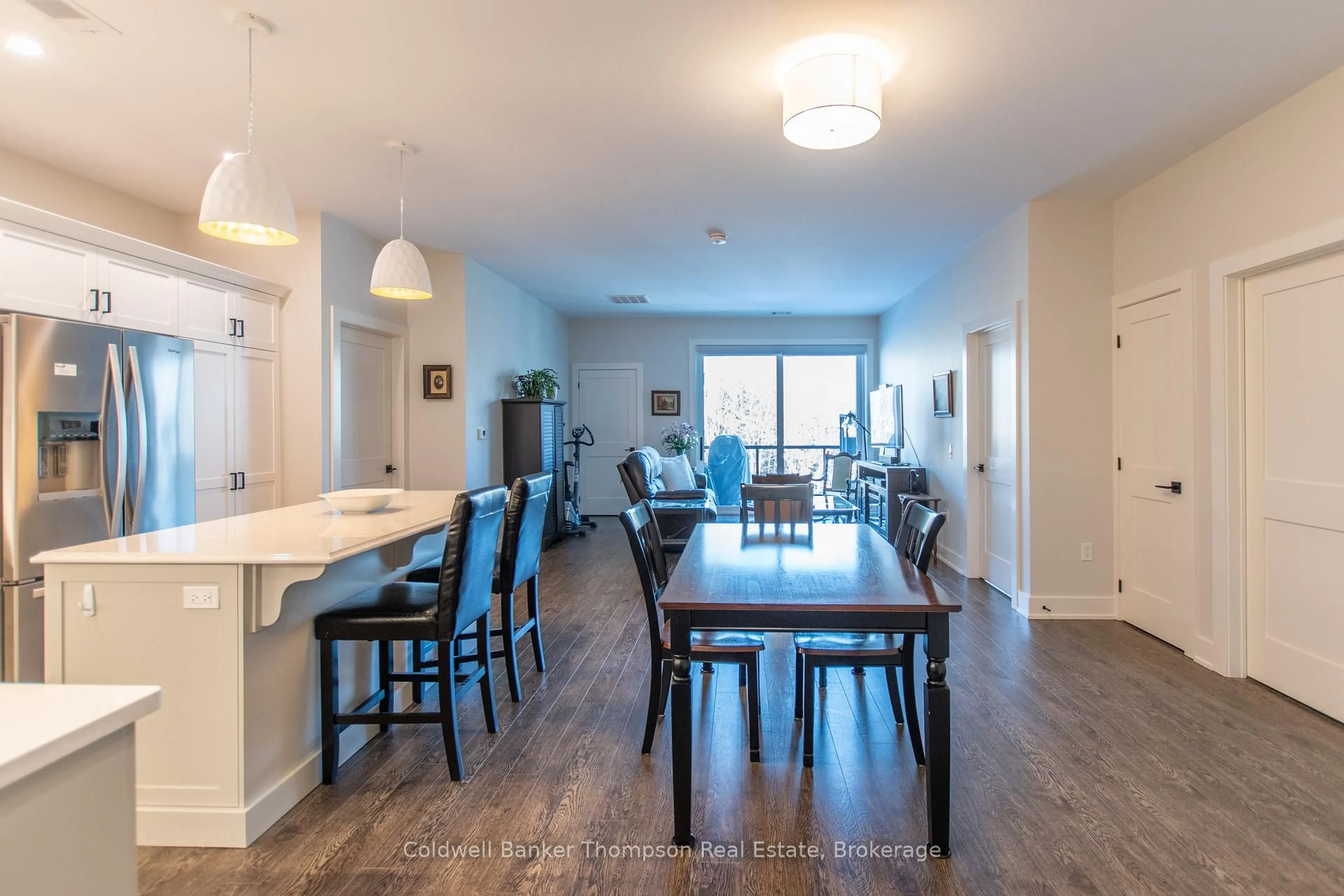 Dining room, wood/laminate floor for 23 Campus Tr #202, Huntsville Ontario P1H 0G1