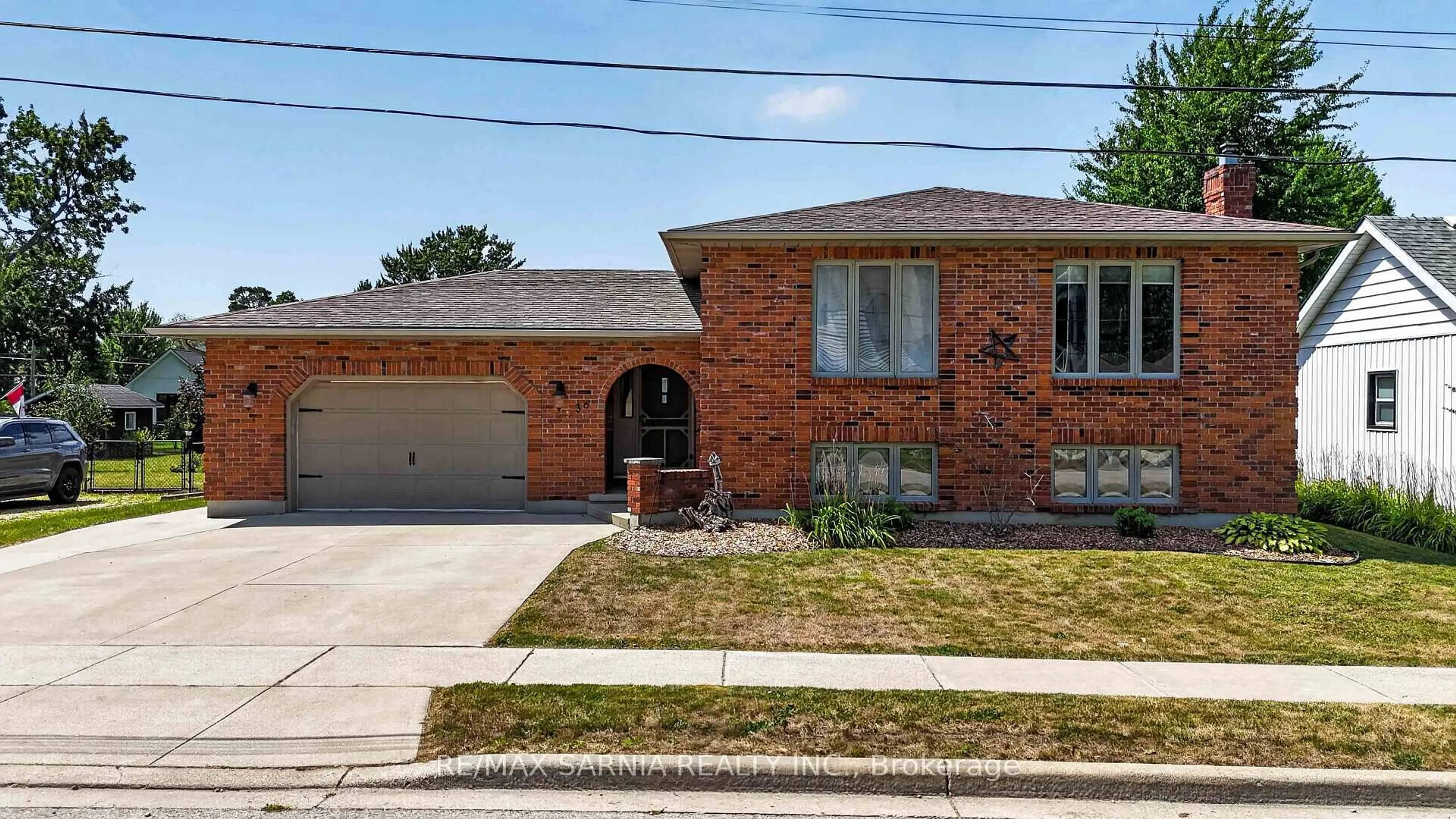 Home with brick exterior material, street for 36 UNION St, Lambton Shores Ontario N0N 1J0