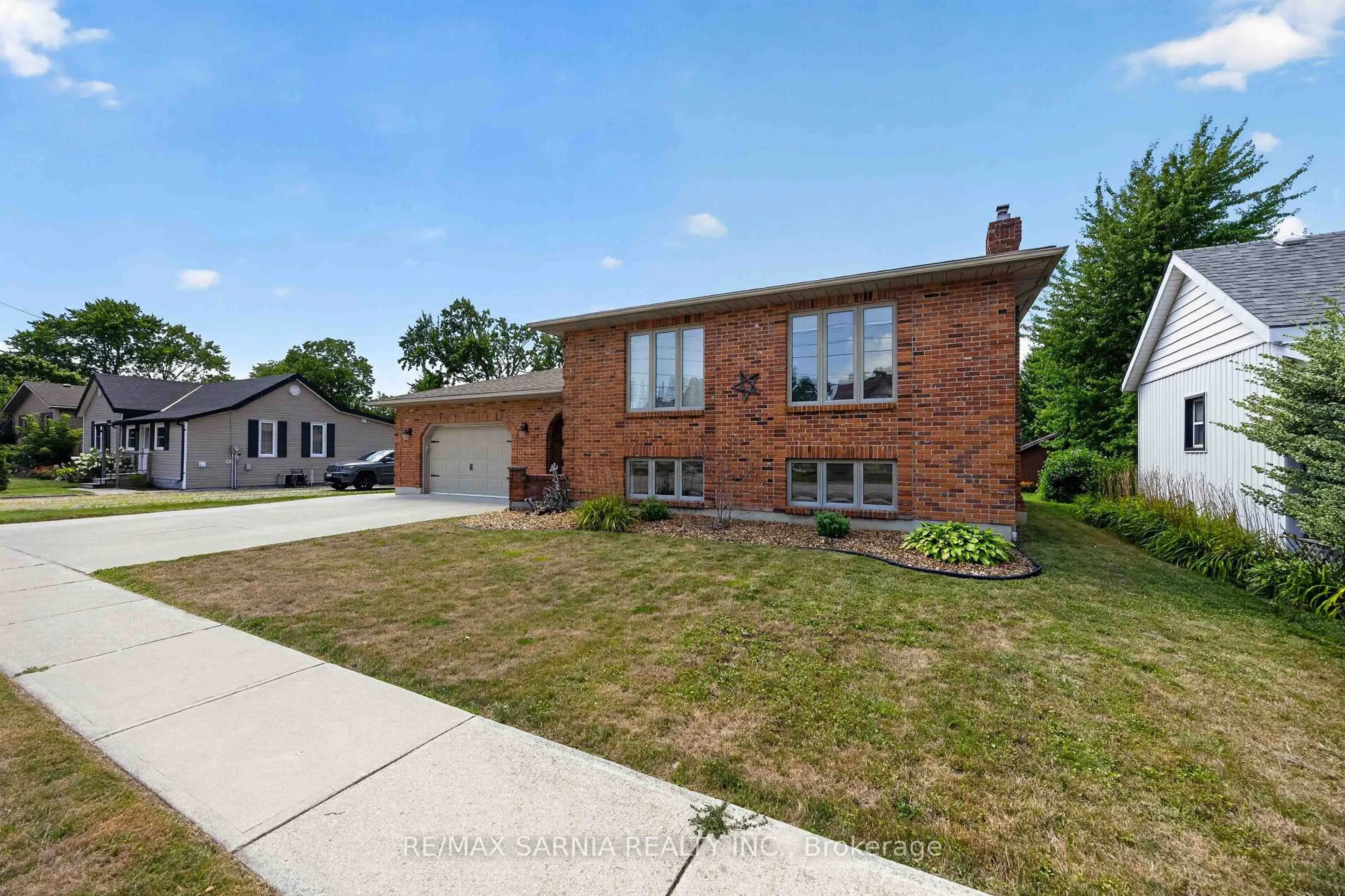 Home with brick exterior material, street for 36 UNION St, Lambton Shores Ontario N0N 1J0
