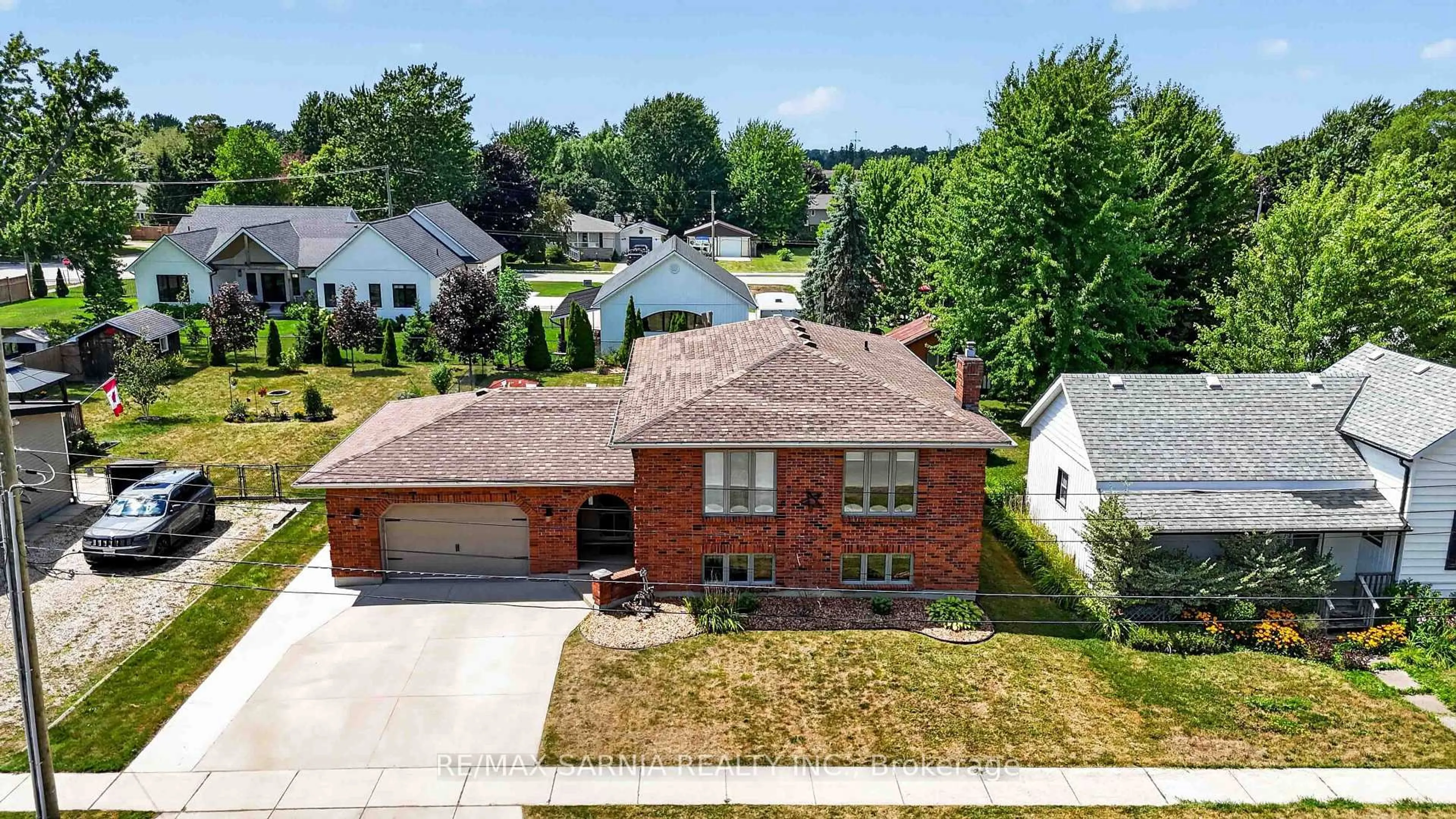 A pic from outside/outdoor area/front of a property/back of a property/a pic from drone, street for 36 UNION St, Lambton Shores Ontario N0N 1J0