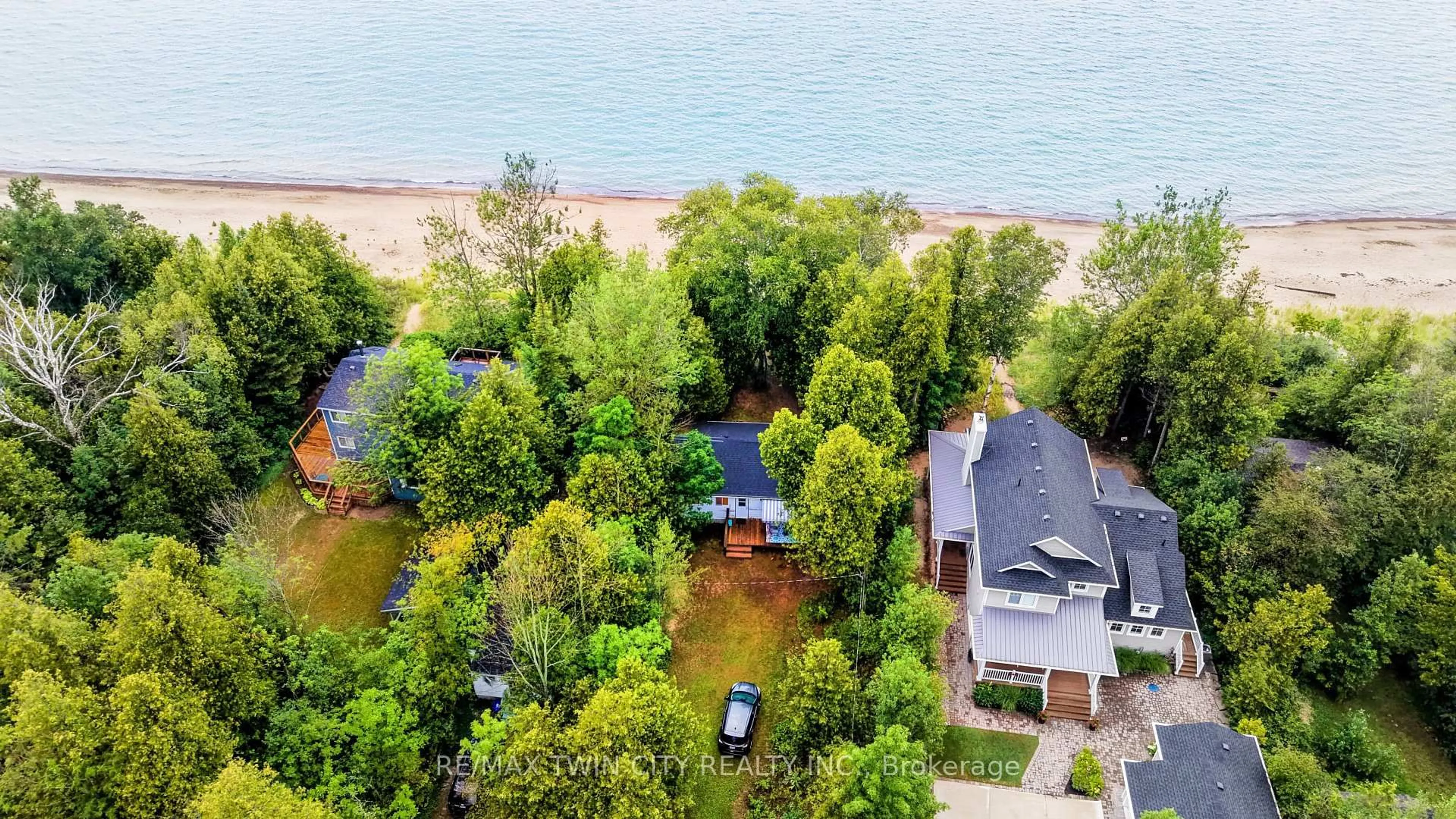 A pic from outside/outdoor area/front of a property/back of a property/a pic from drone, water/lake/river/ocean view for 757 Victoria Rd, Huron-Kinloss Ontario N0G 2R0
