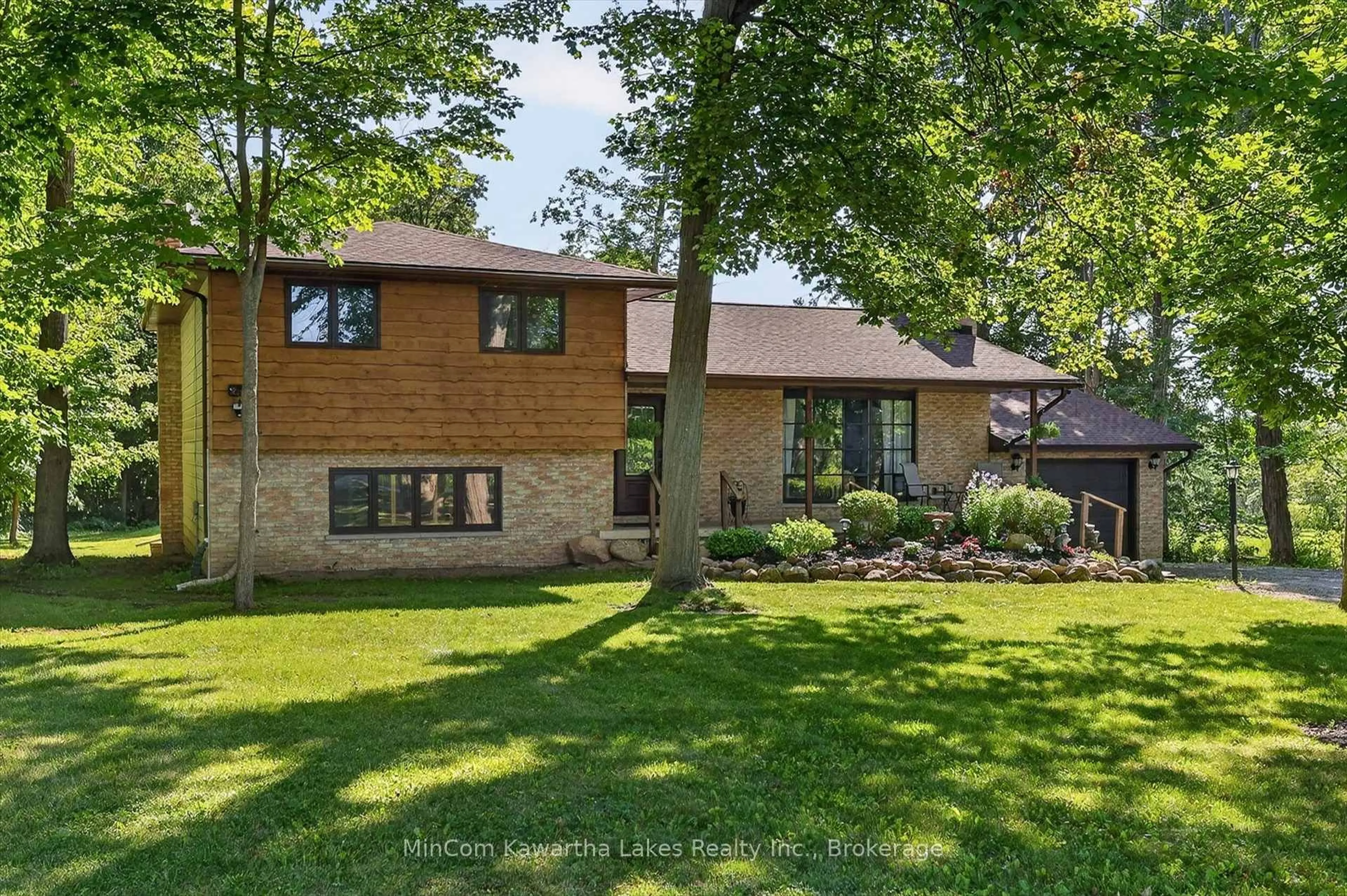 Home with brick exterior material, street for 74 Orange Corners Rd, Kawartha Lakes Ontario K0L 2W0