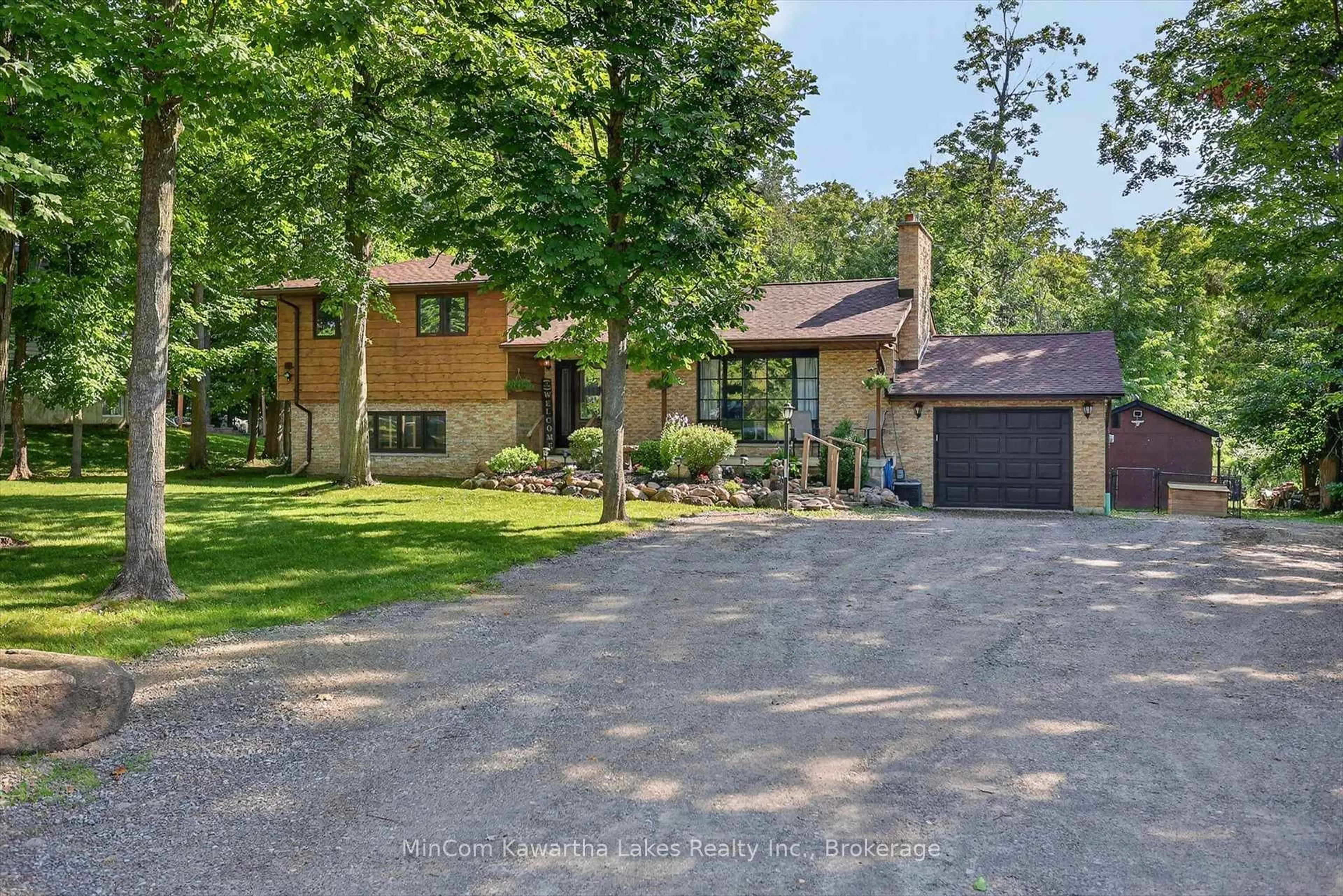 A pic from outside/outdoor area/front of a property/back of a property/a pic from drone, unknown for 74 Orange Corners Rd, Kawartha Lakes Ontario K0L 2W0