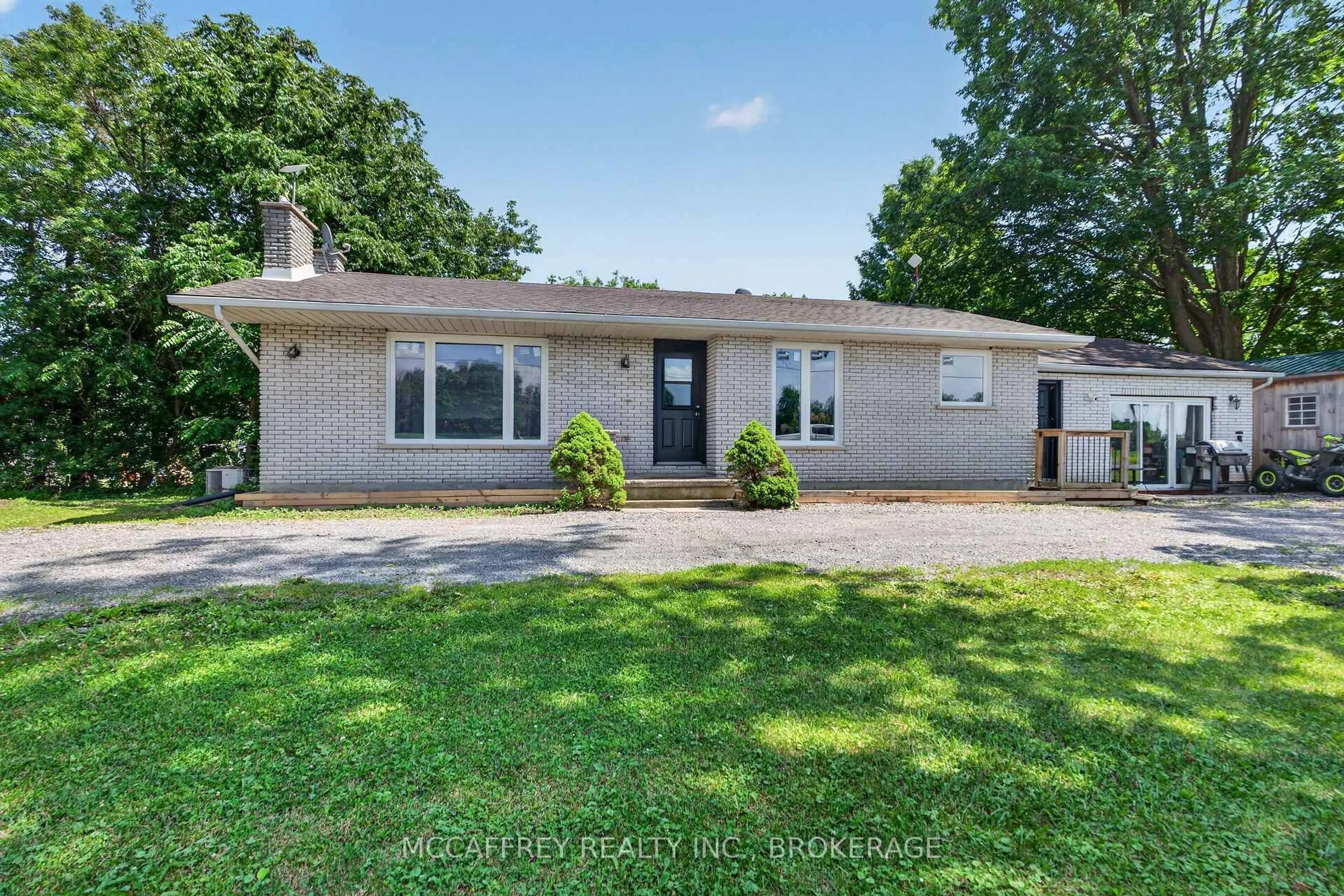 Home with vinyl exterior material, street for 1692 Sharpe Rd, Bissett Creek Ontario K0H 2H0