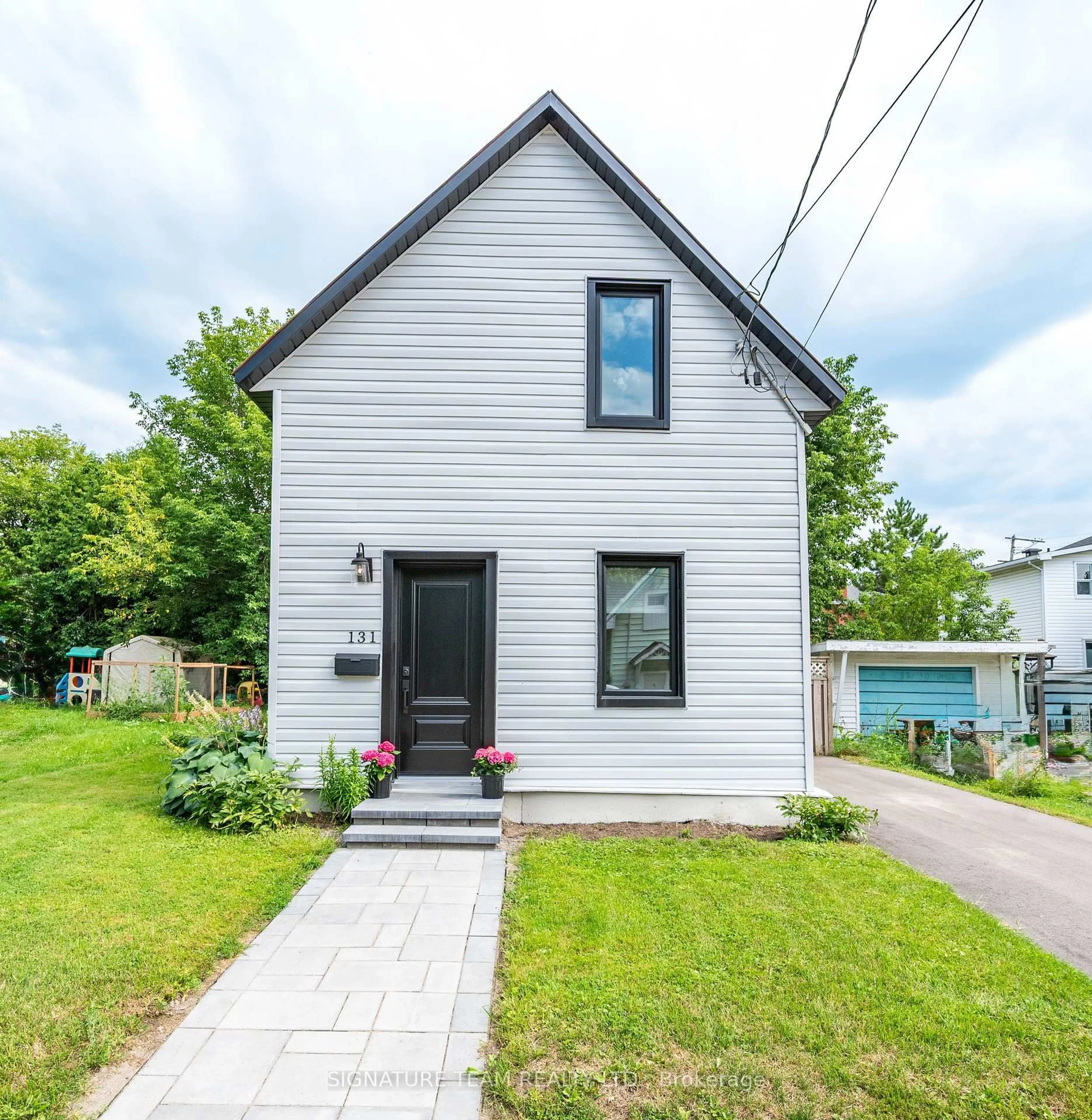 Home with vinyl exterior material, street for 131 Patrick Ave, Renfrew Ontario K7V 3H3
