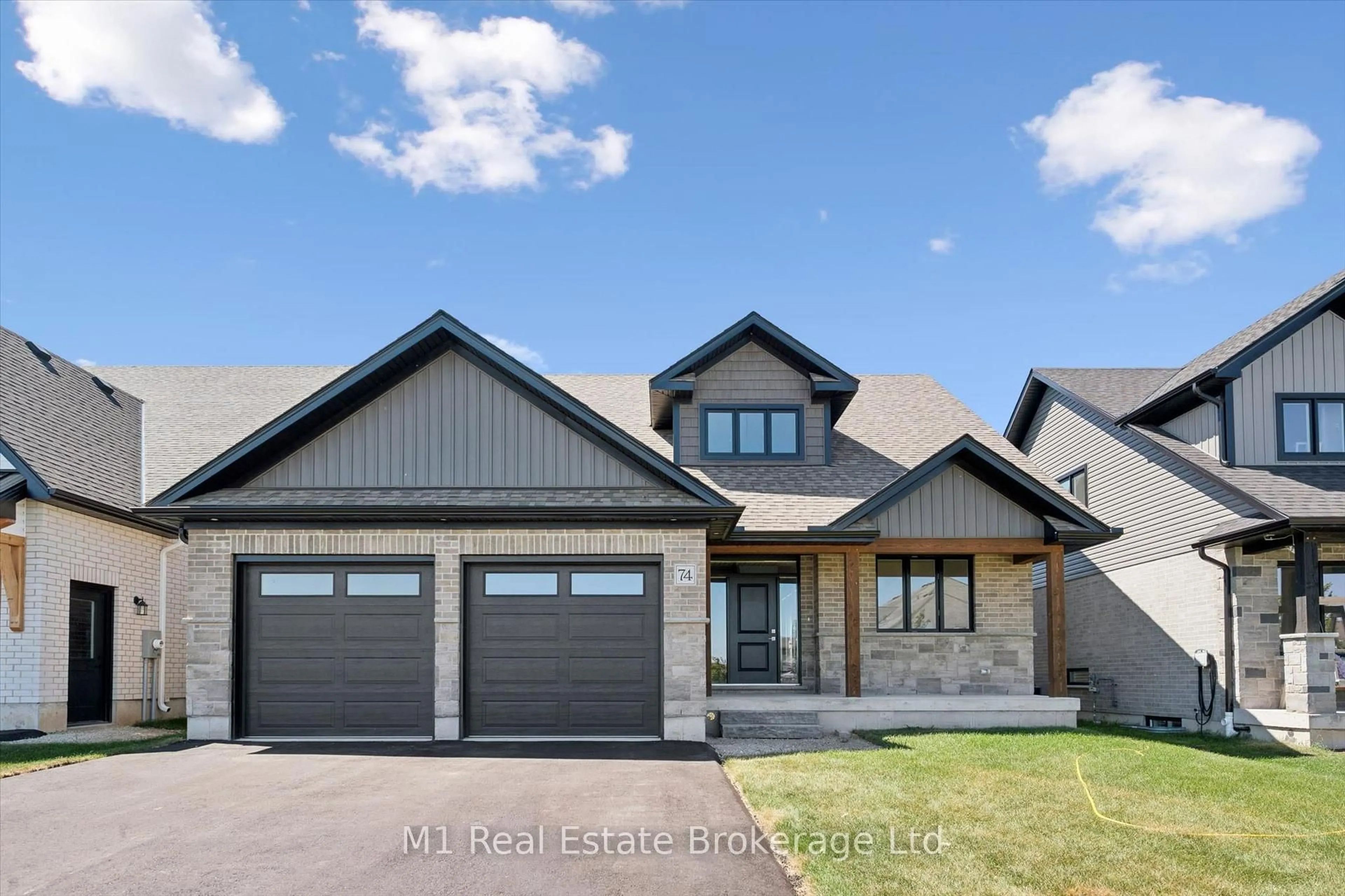 Home with brick exterior material, street for 74 Bedell Dr, Mapleton Ontario N0G 1P0