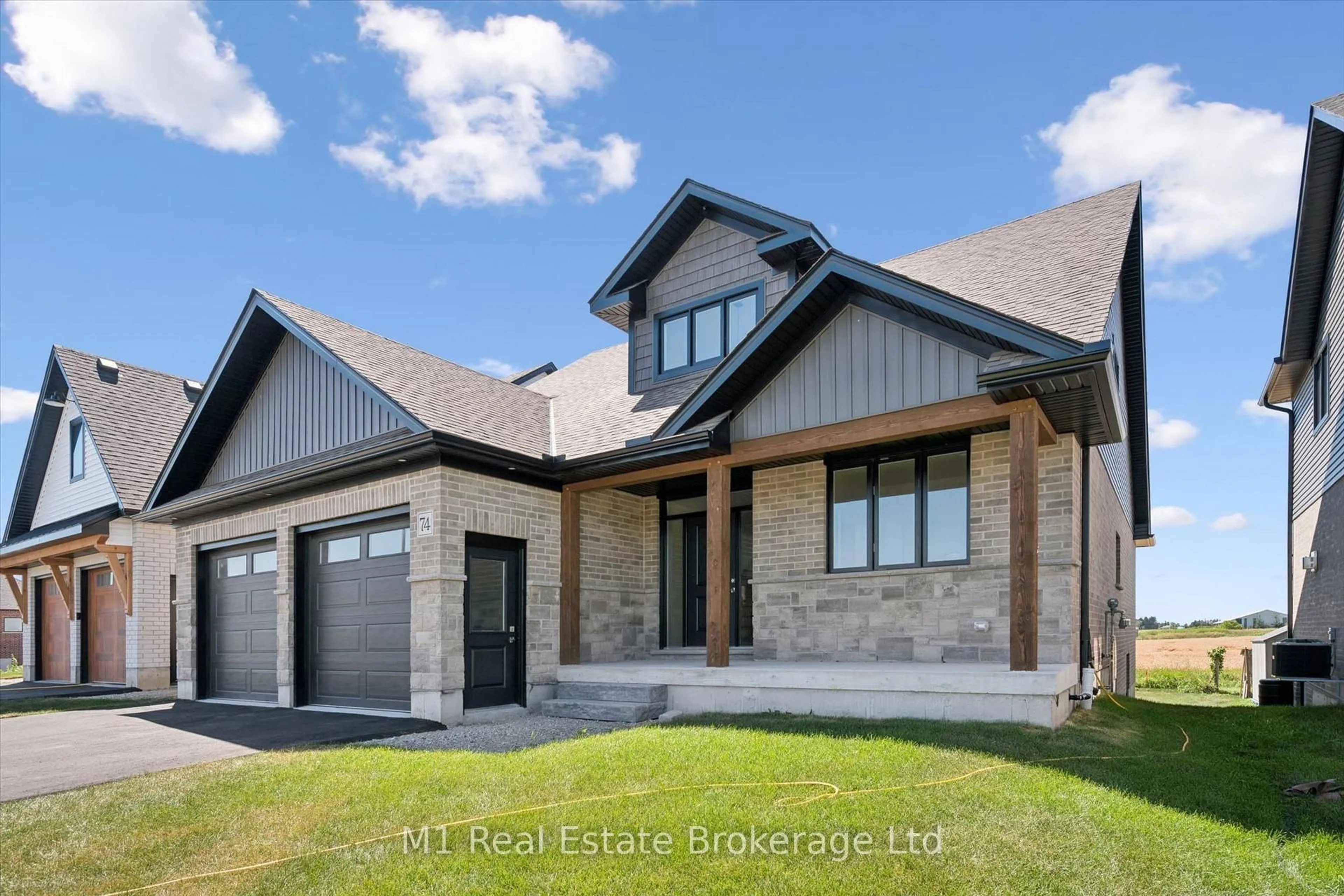 Home with brick exterior material, street for 74 Bedell Dr, Mapleton Ontario N0G 1P0