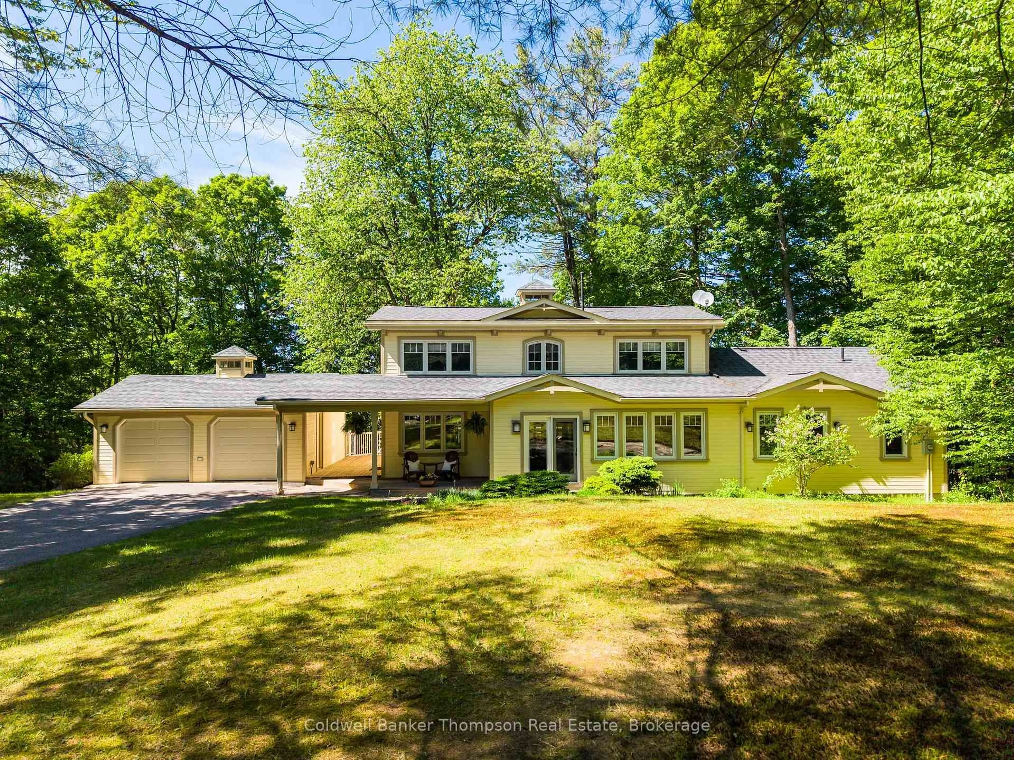 A pic from outside/outdoor area/front of a property/back of a property/a pic from drone, street for 312 Swallowdale Rd, Huntsville Ontario P1H 0A5