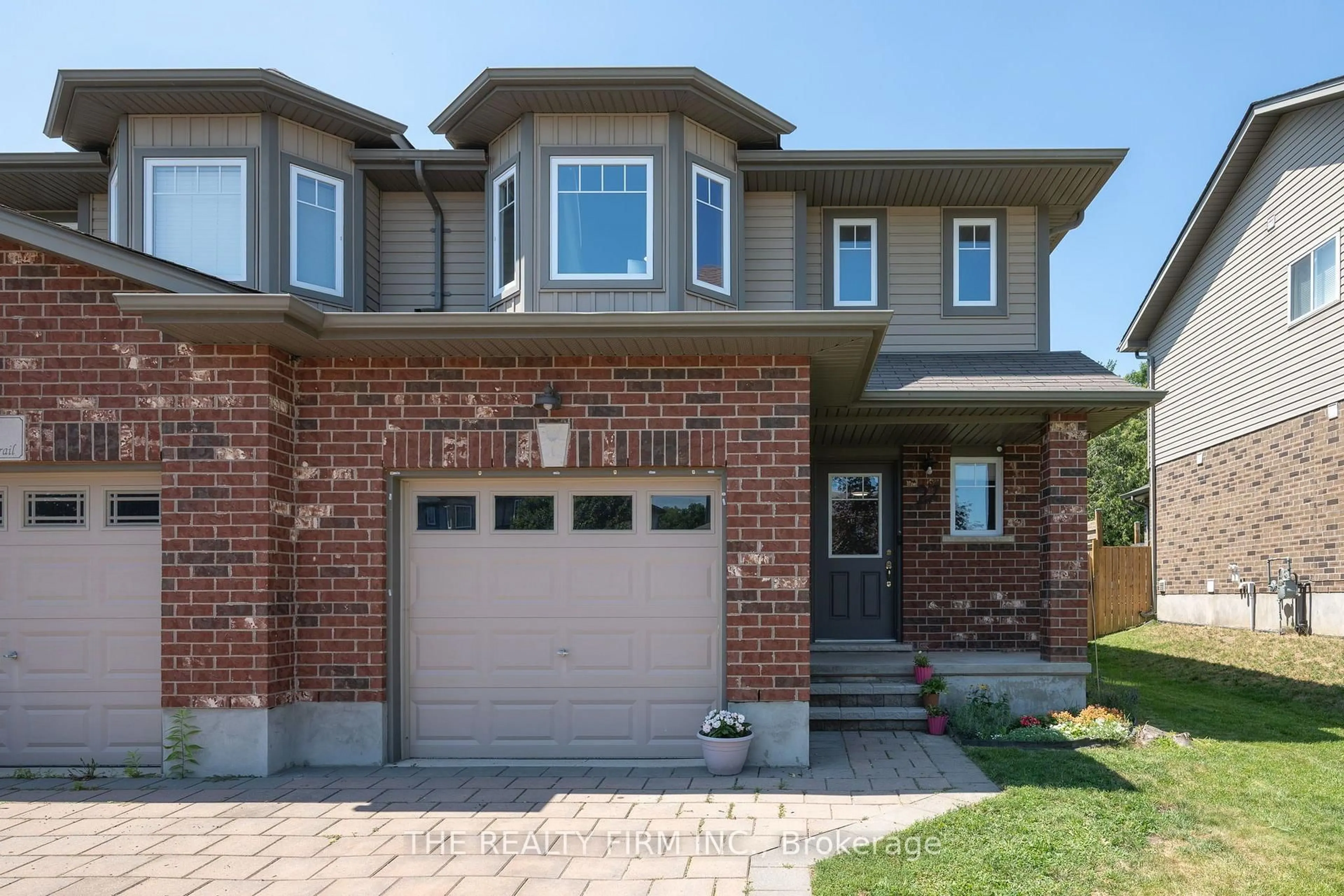 Home with brick exterior material, street for 27 Leesboro Tr, Thames Centre Ontario N0M 2P0