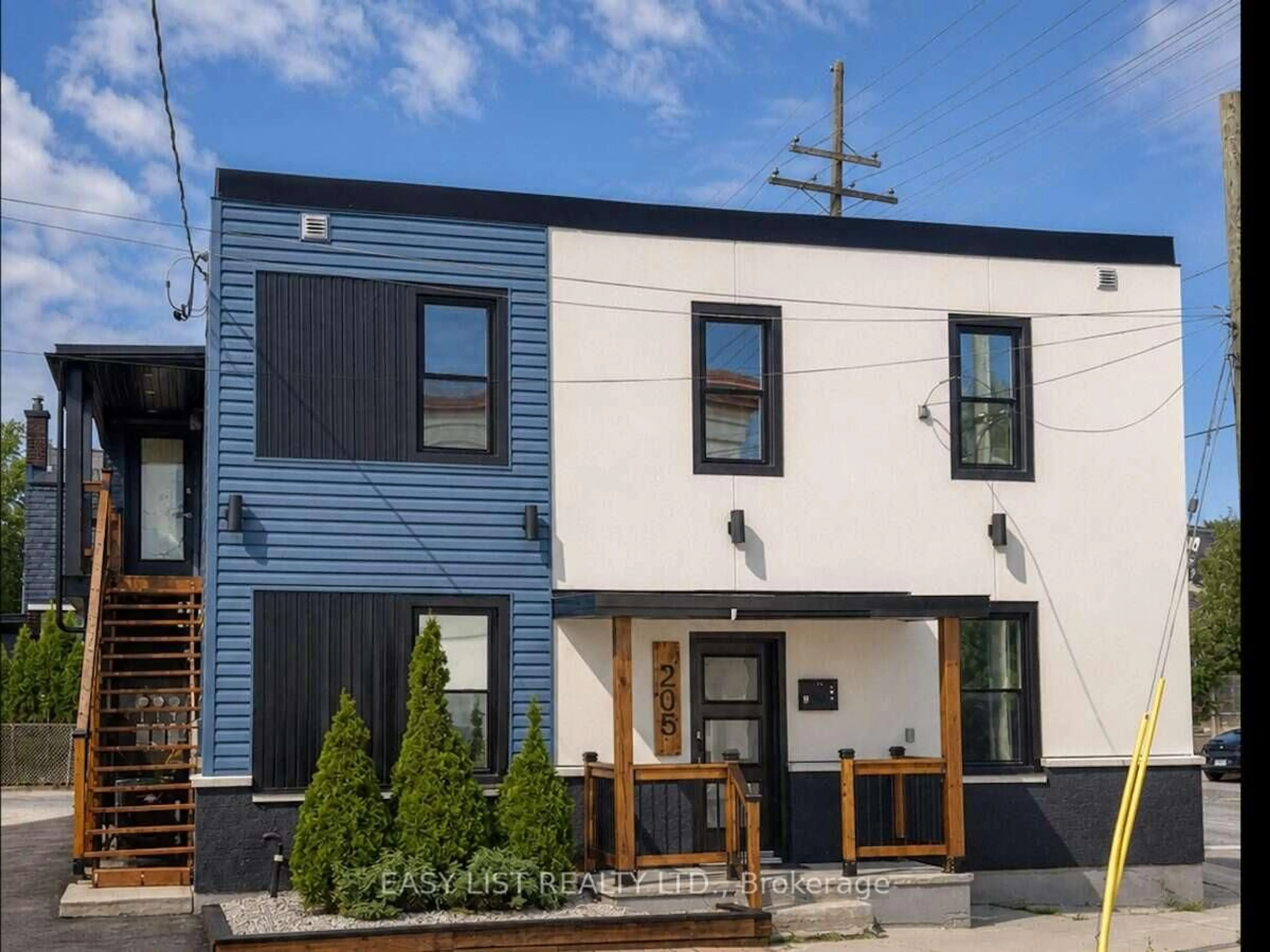 Home with vinyl exterior material, street for 205 Marier Ave, Ottawa Ontario K1L 5R6