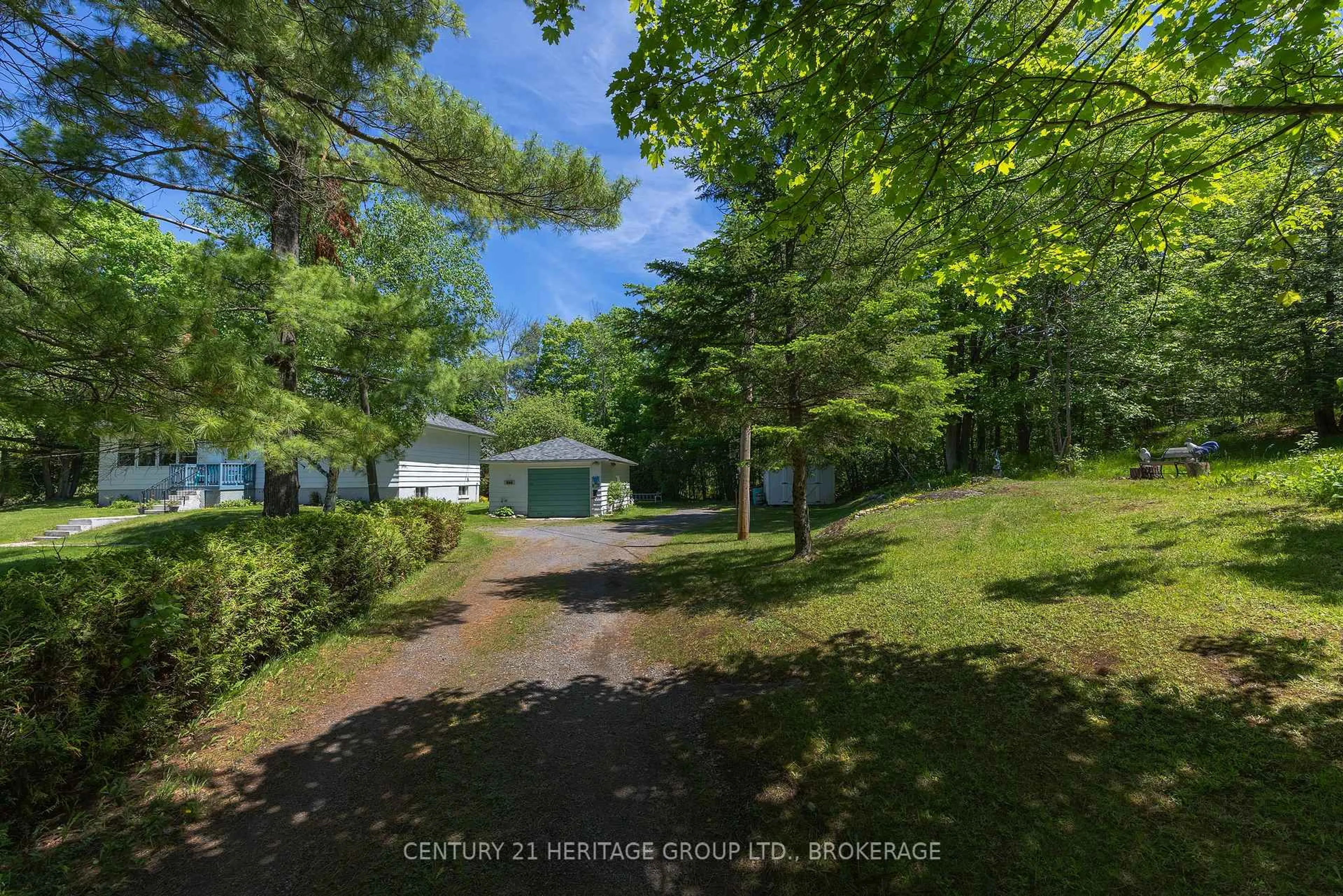A pic from outside/outdoor area/front of a property/back of a property/a pic from drone, forest/trees view for 6104 Highway 38, Verona Ontario K0H 2W0