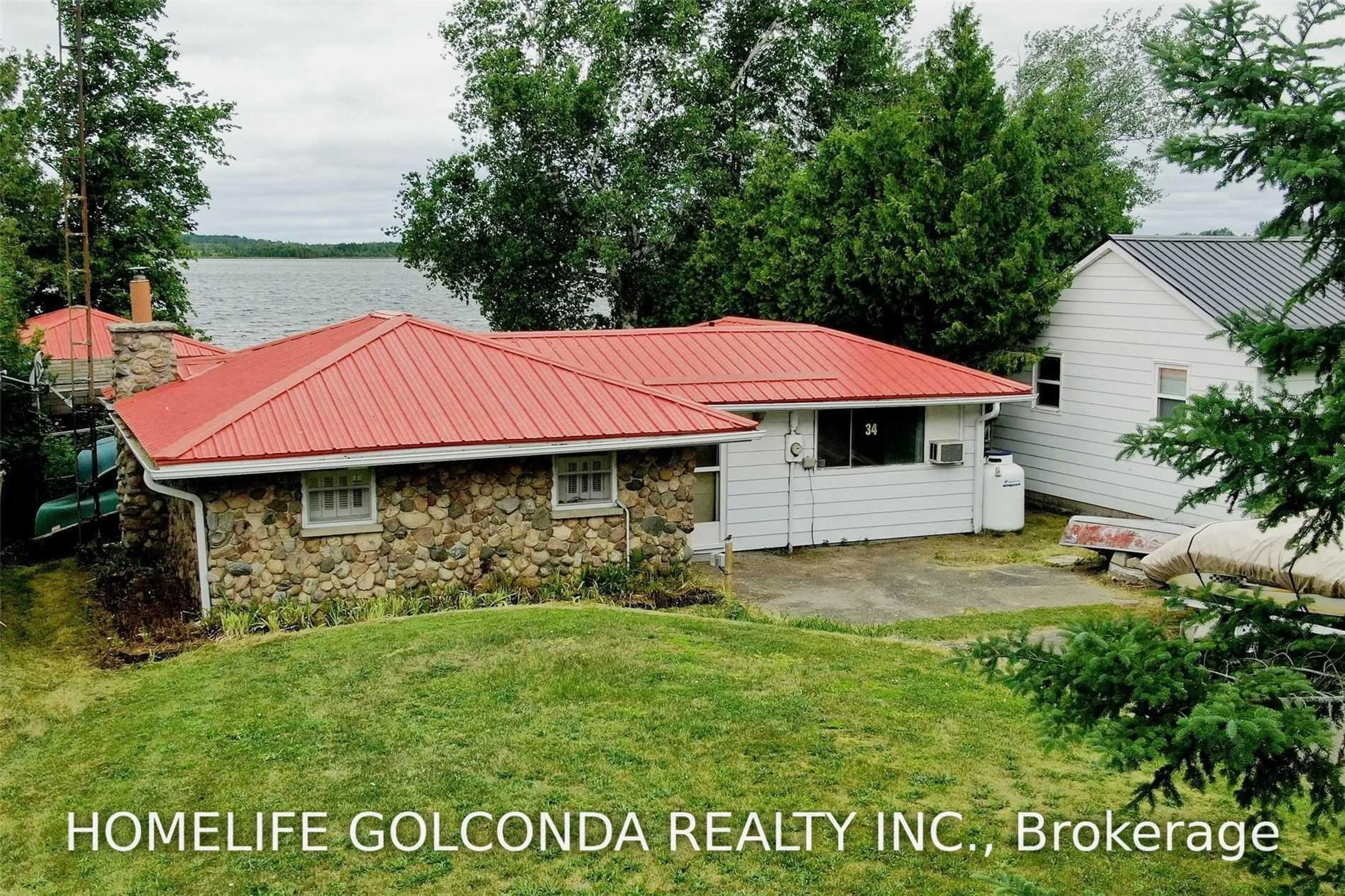 A pic from outside/outdoor area/front of a property/back of a property/a pic from drone, building for 34 Antiquary Rd, Kawartha Lakes Ontario K0M 2B0