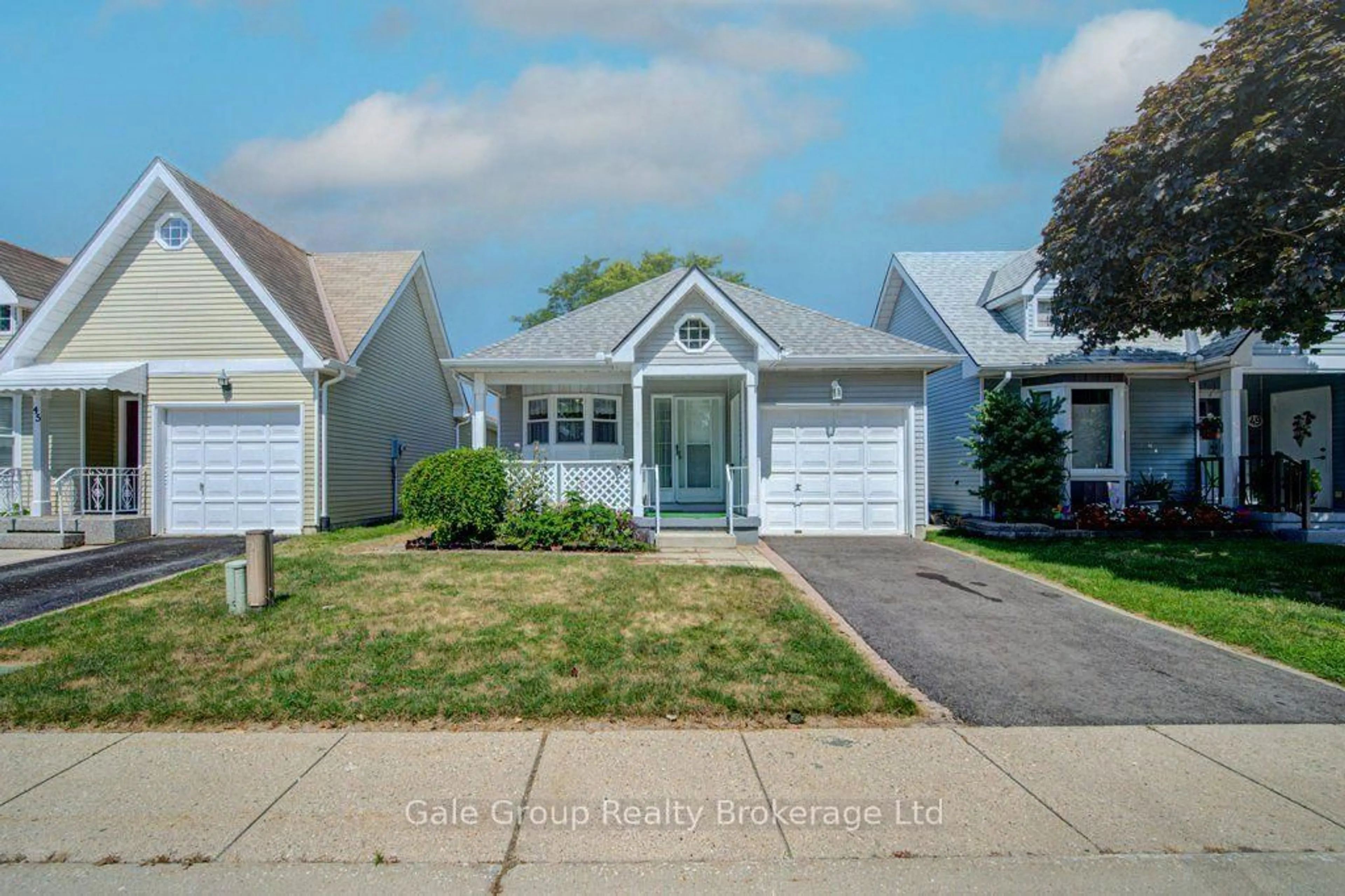 Home with vinyl exterior material, street for 47 Seres Dr, Tillsonburg Ontario N4G 5E9