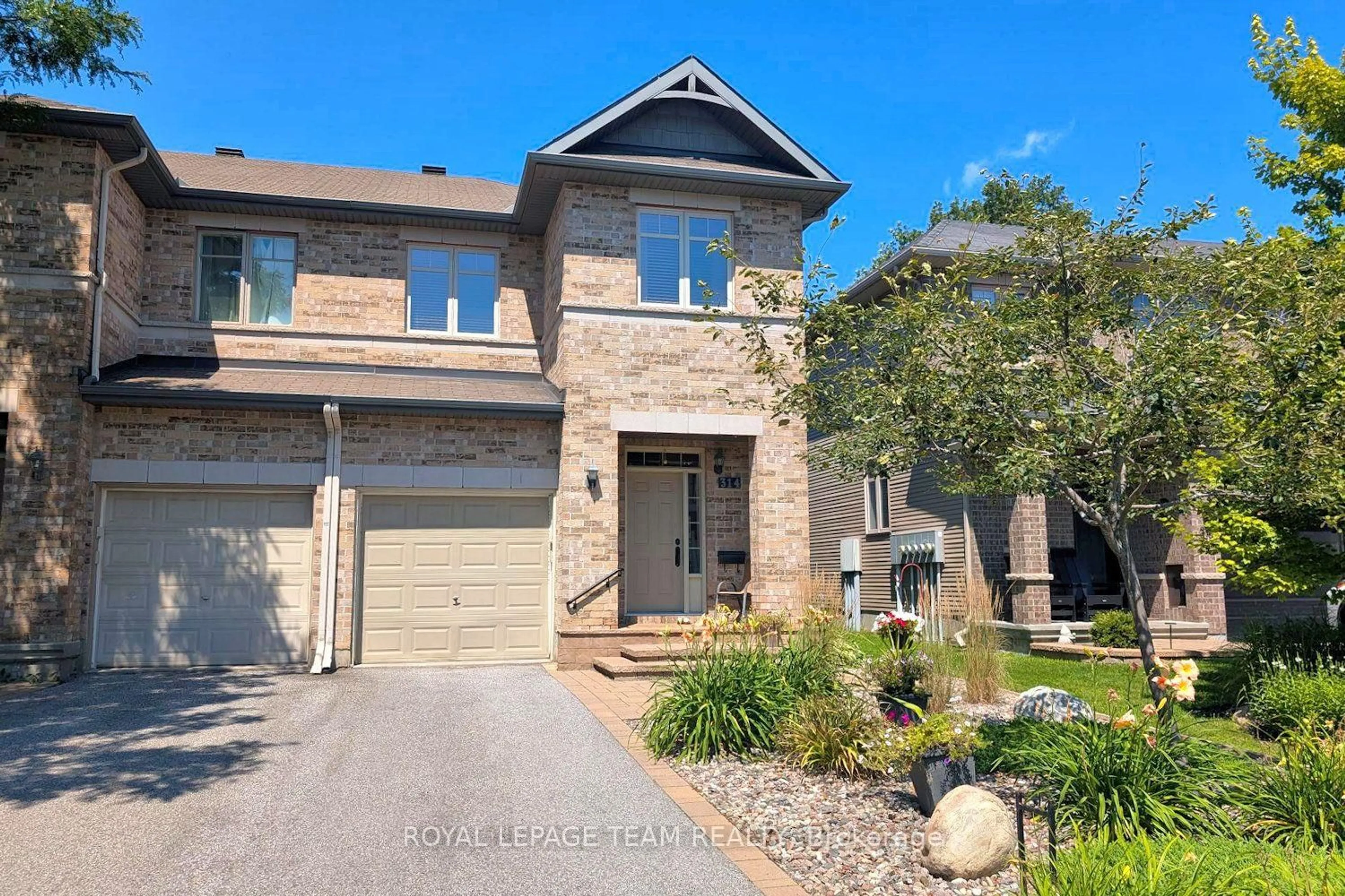 Home with brick exterior material, street for 314 Badgeley Ave, Ottawa Ontario K2T 0A6