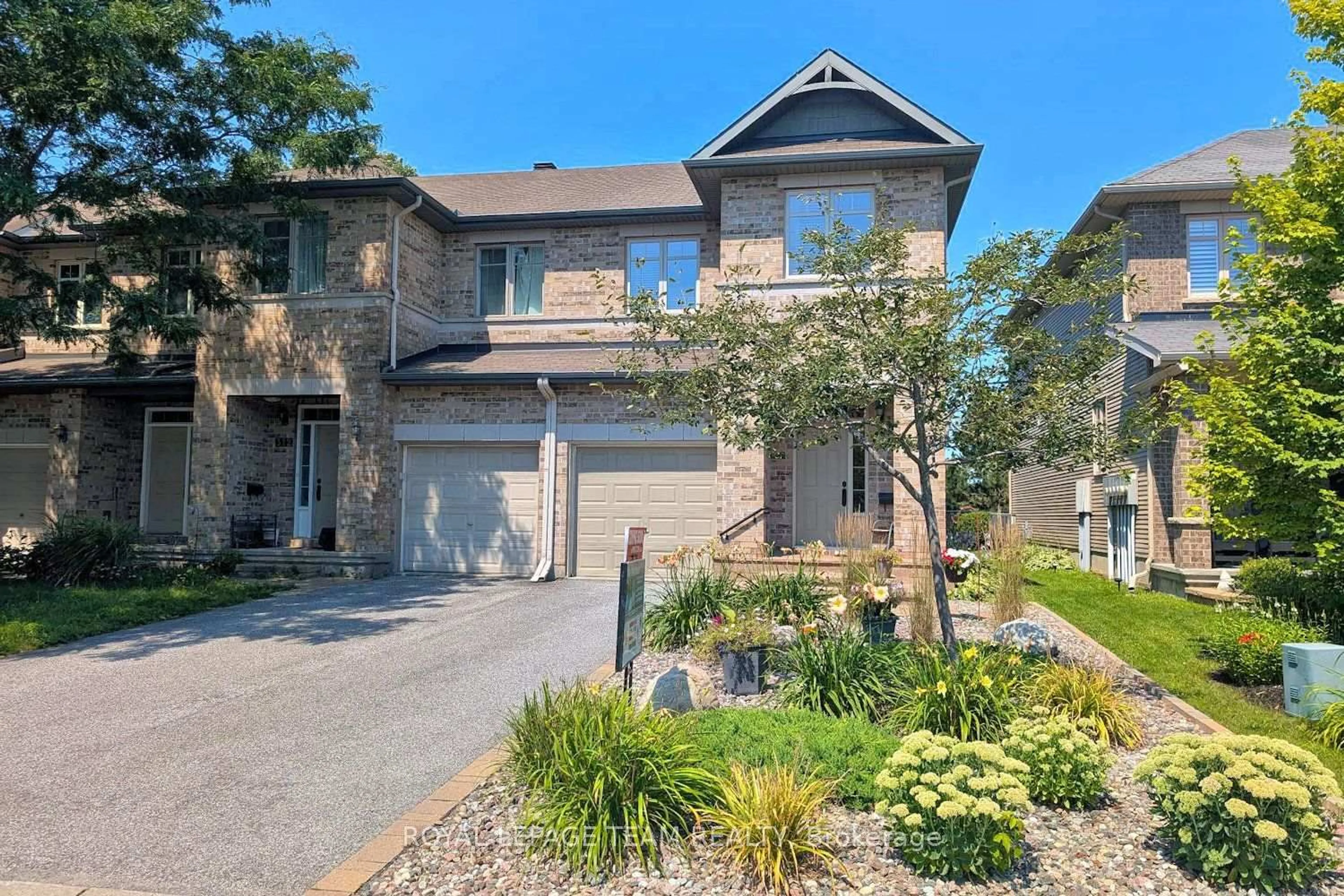 Home with brick exterior material, street for 314 Badgeley Ave, Ottawa Ontario K2T 0A6