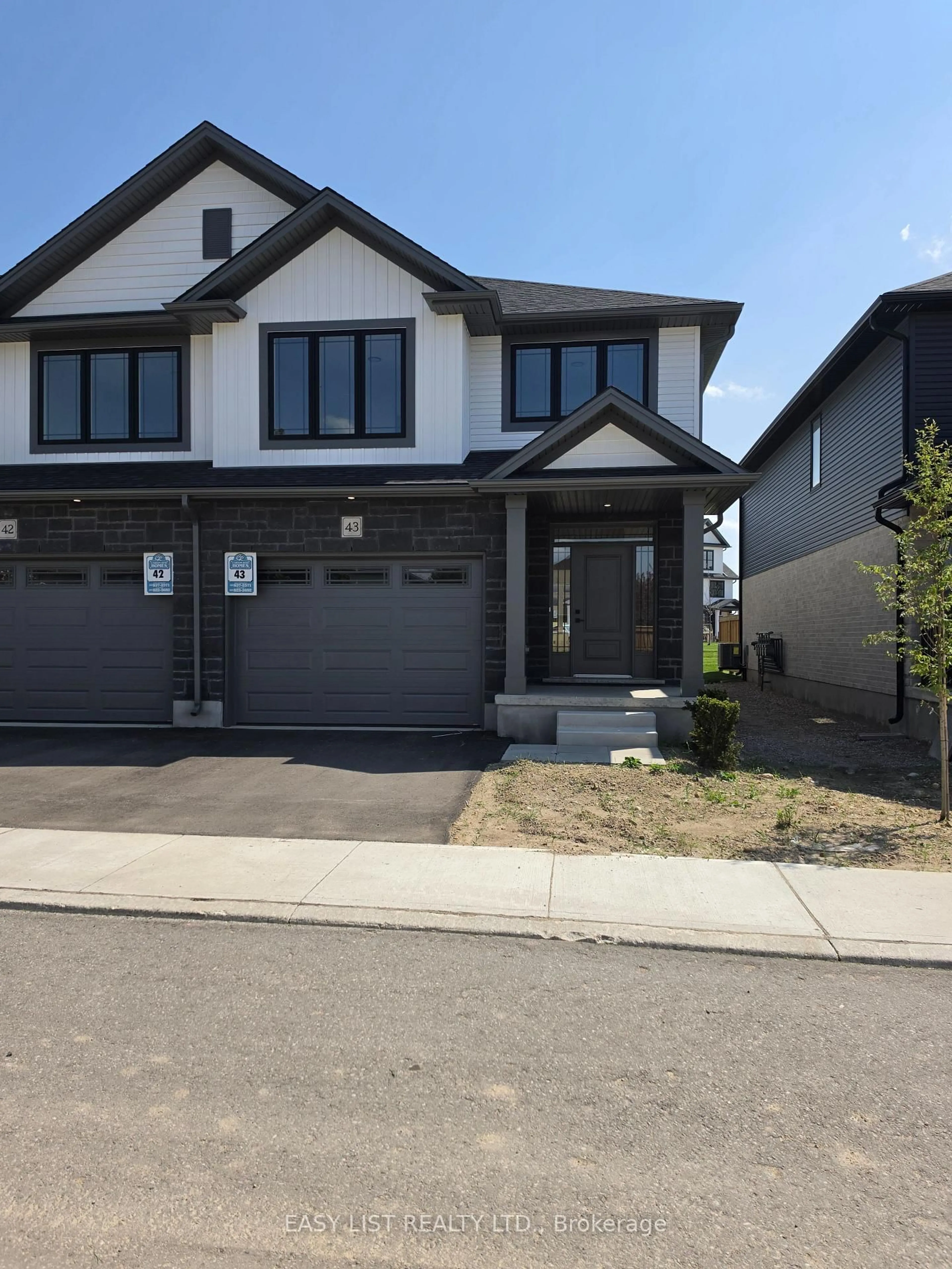 Home with brick exterior material, street for 55 Teal Dr #43, Guelph Ontario N1C 1G4