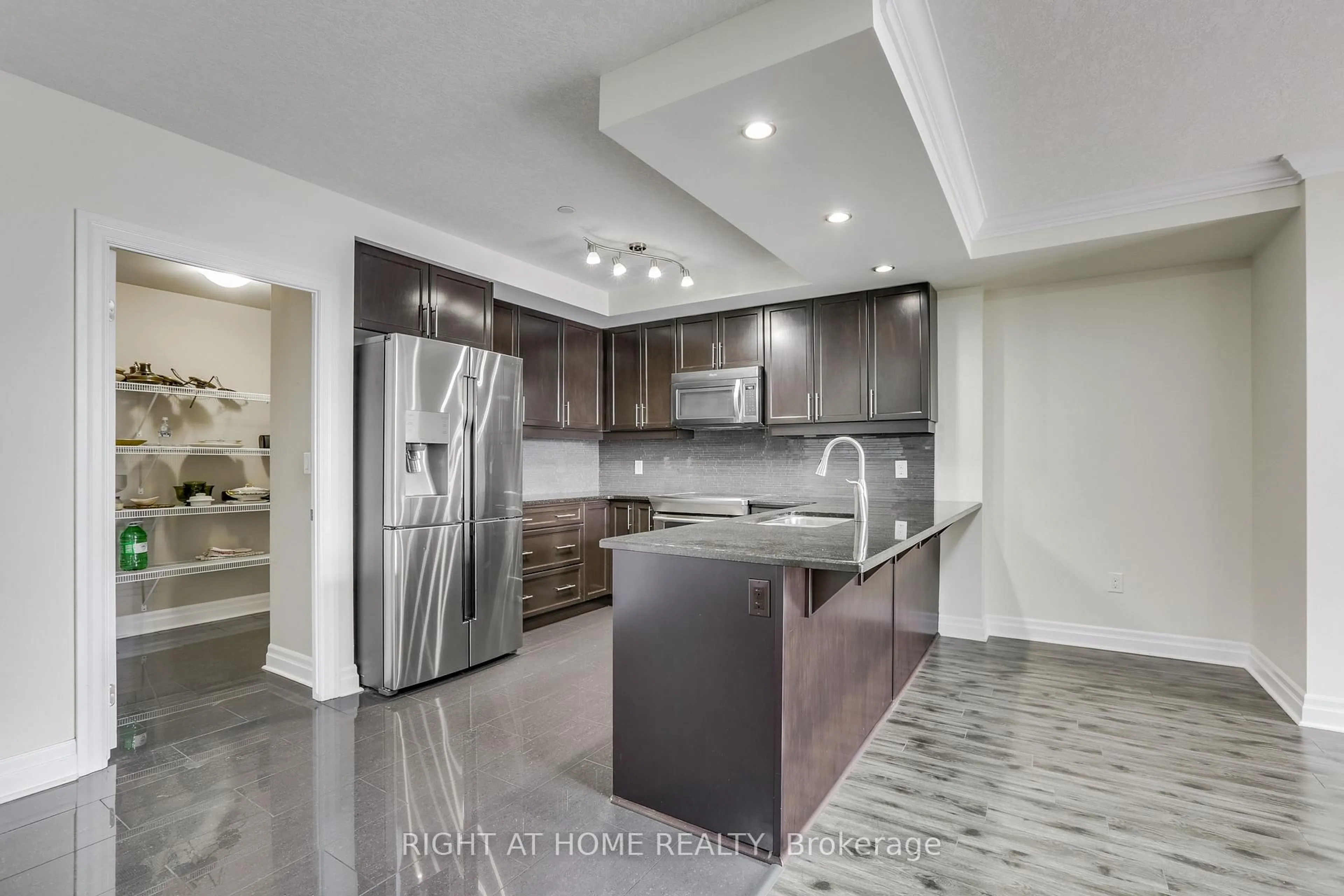 Open concept kitchen, ceramic/tile floor for 240 Villagewalk Blvd #212, London North Ontario N6G 0P6