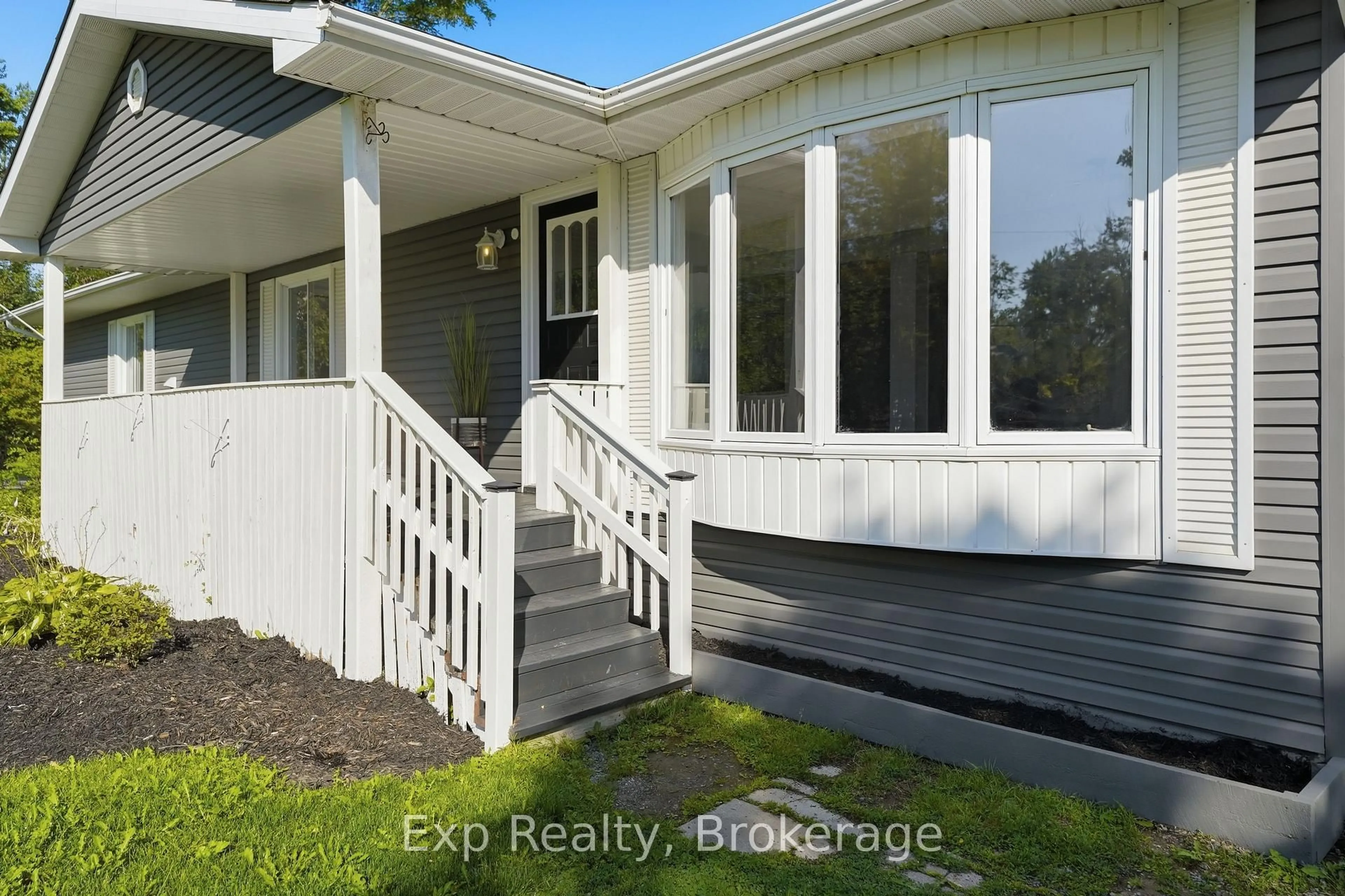 Home with vinyl exterior material, water/lake/river/ocean view for 85 River Garden Rd, Limoges Ontario K0K 2M0