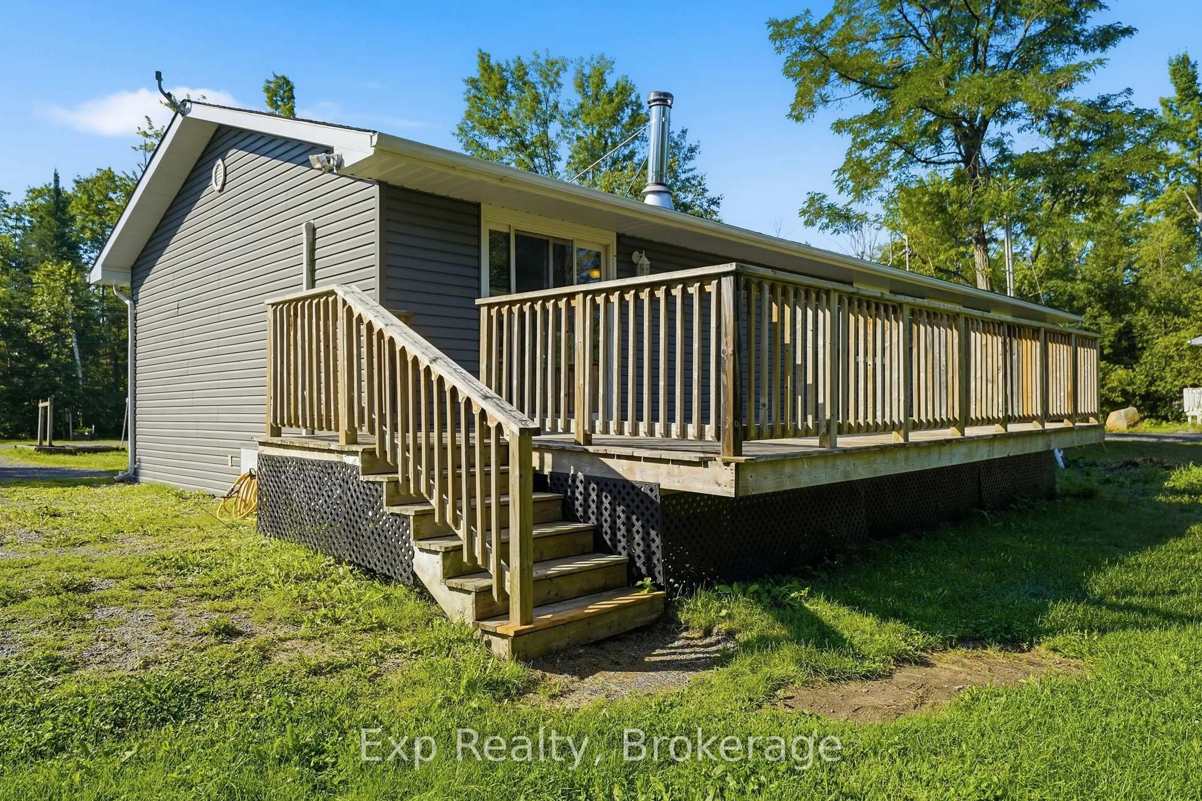 Patio, water/lake/river/ocean view for 85 River Garden Rd, Limoges Ontario K0K 2M0
