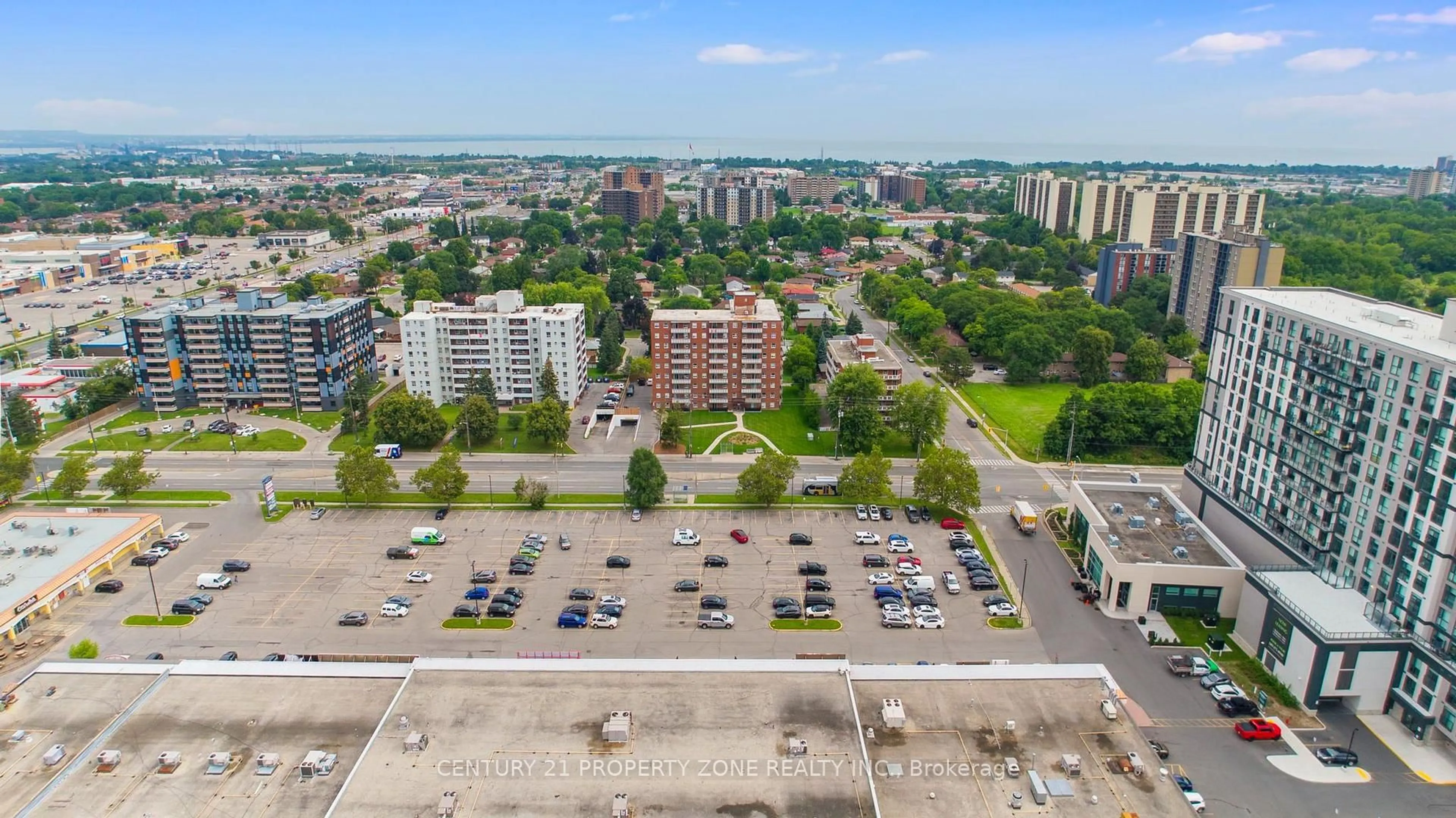 A pic from outside/outdoor area/front of a property/back of a property/a pic from drone, city buildings view from balcony for 851 Queenston Rd #105, Hamilton Ontario L8G 1B4