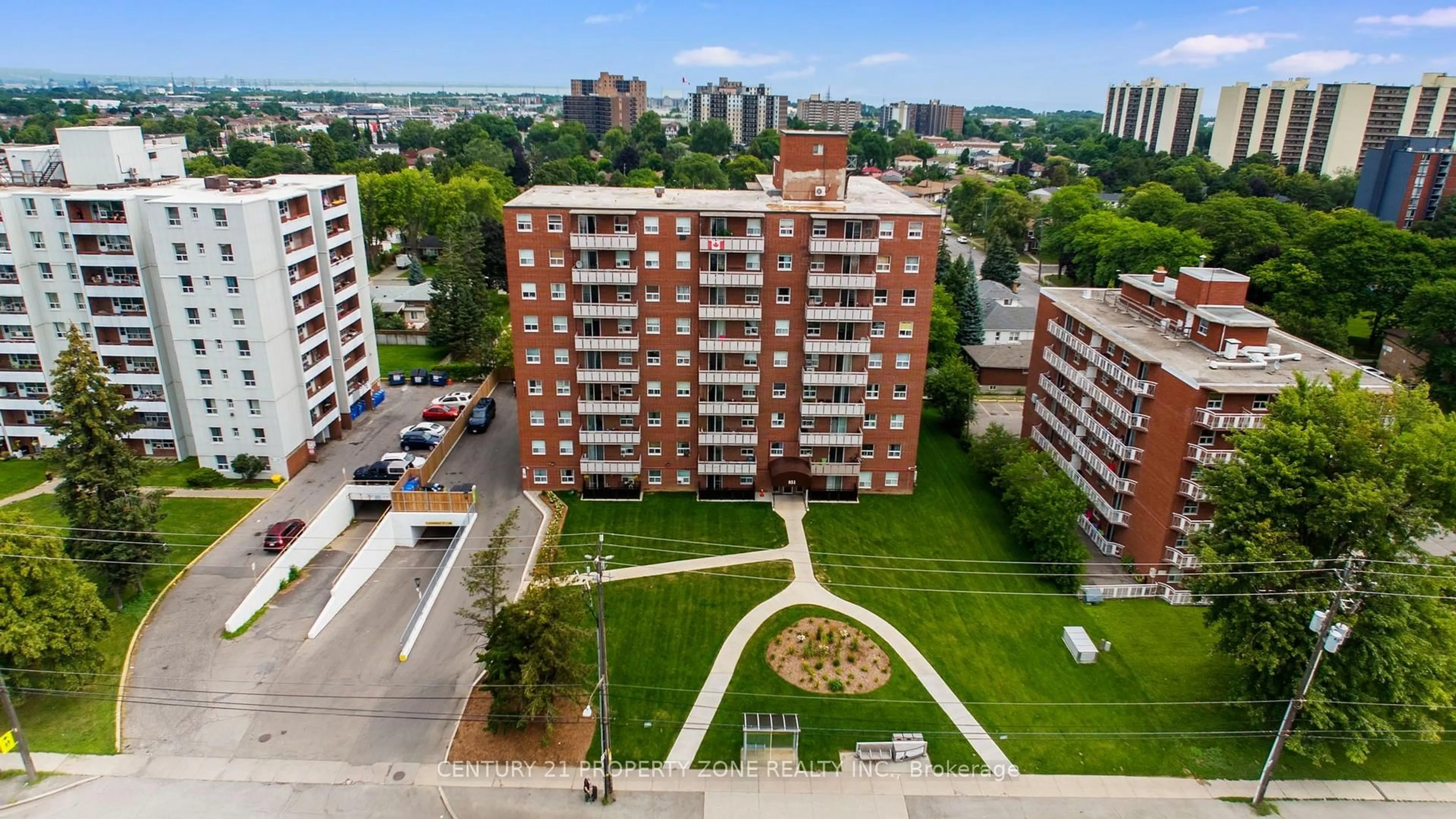 A pic from outside/outdoor area/front of a property/back of a property/a pic from drone, city buildings view from balcony for 851 Queenston Rd #105, Hamilton Ontario L8G 1B4