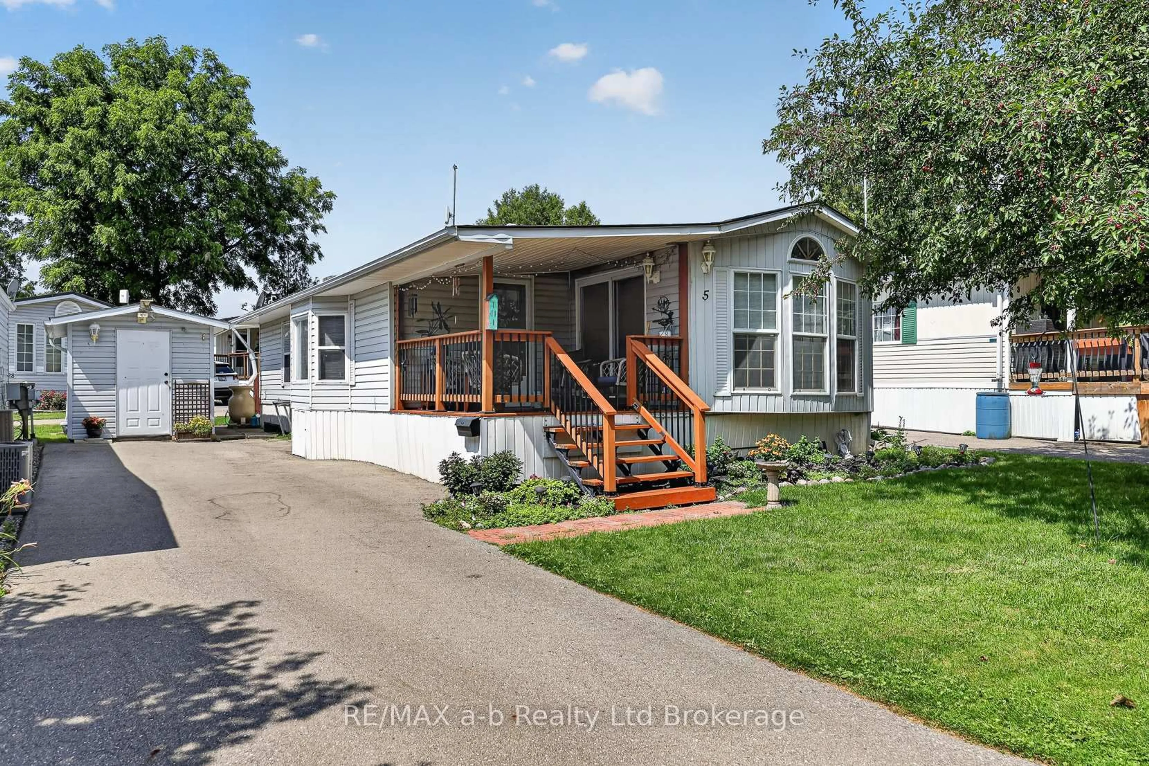 Home with vinyl exterior material, street for 595487 59 #5, East Zorra-Tavistock Ontario N4S 7W1