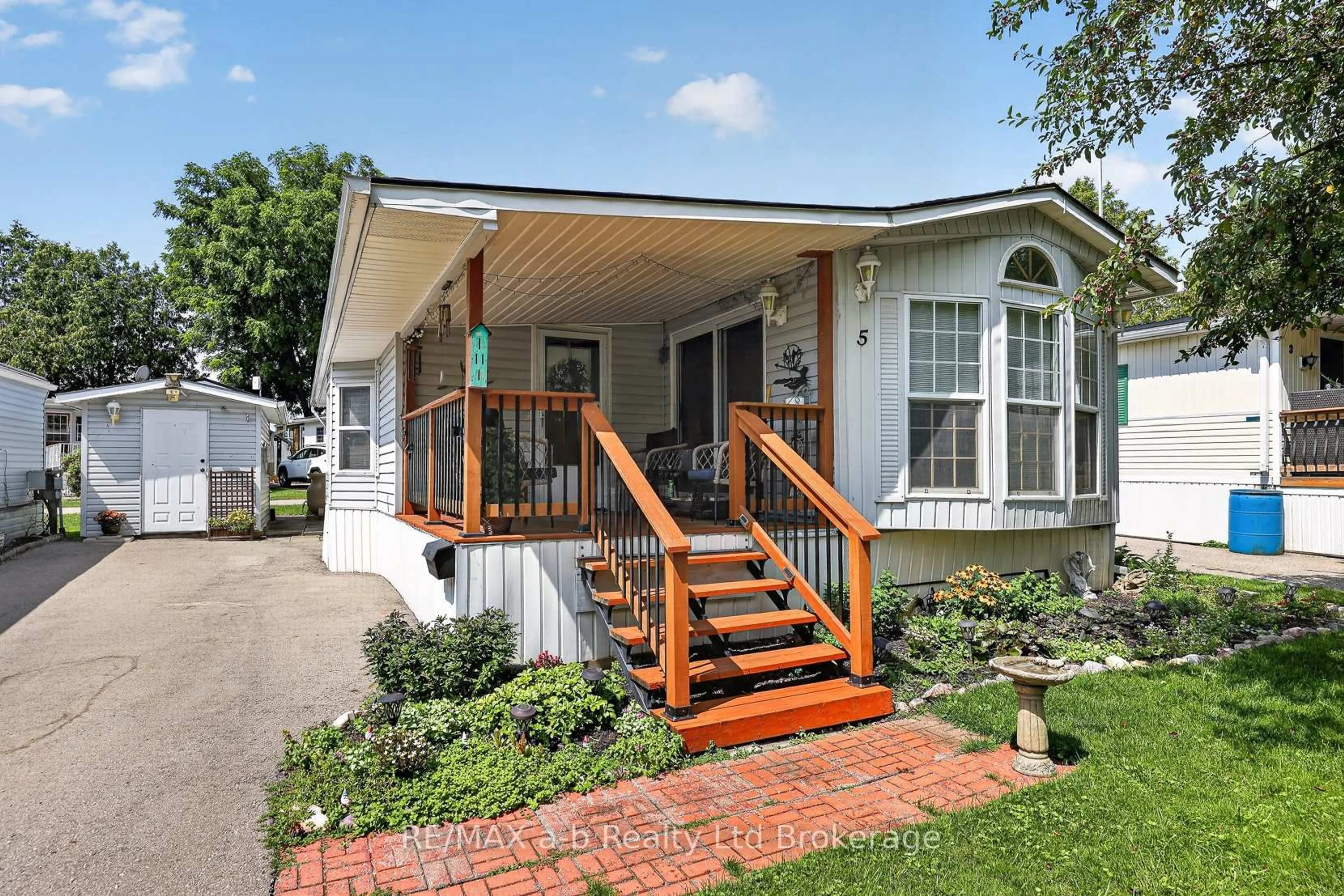 Home with vinyl exterior material, street for 595487 59 #5, East Zorra-Tavistock Ontario N4S 7W1